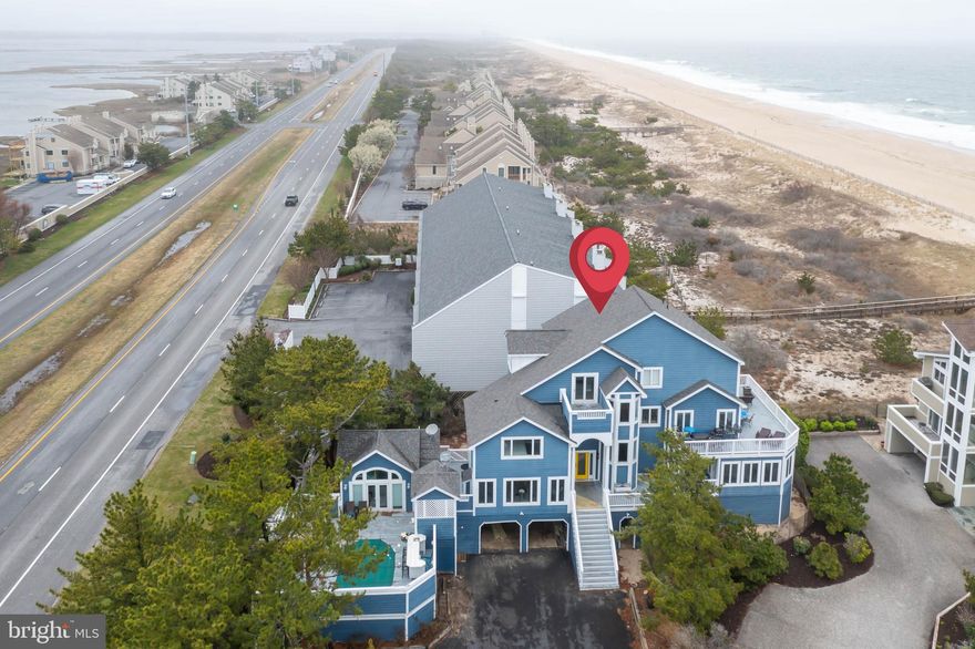One-of-a-kind home on Owens Ct.! Seller can show over $200K in annual Rental Income. This custom-built, unparalleled masterpiece is sequestered in enclave of 6 private estate homes and offers best of both worlds with breathtaking ocean and bay views, incredible sunrises and sunsets and profound peacefulness that is priceless. Just steps away from a most sought-after beach destination, this Fenwick home is nestled along the shoreline and just steps from sandy beaches, warming sun, and rhythmic rolling of waves. Own it and enjoy it year ‘round. Rent it and reap the rewards. Rental potential is extraordinary! This coastal contemporary home offers resort-style getaway of highest standards in a 3.5 level, over 4,700 sq. ft. home that is enveloped in aura of tranquility and serenity, and offers private heated pool, outdoor shower, cabana/separate apartment and so much more! Imposing steps lead up to arched covered entrance of this amazing multi-faceted roof architectural beauty with myriad of windows, numerous decks, and exquisite views. Main living space is luxurious and sun-drenched showcasing sequence of never-ending windows, golden polished hardwood floors, and open concept floorplan. Kitchen, DR, and FR create gorgeous triangle of space, where one room seamlessly blends into the next and each room boasts only the finest features.
Gourmet kitchen has top-notched upgraded cabinets, gleaming upgraded granite countertops and sleek
SS appliances, all highlighted by ceramic glass tile backsplash, eclectic lighting, and quality details.
Sweeping breakfast bar stands ready to easily accommodate 5-6 bar stools, while morning nook boasts
picture window and lovely bench seating. Just beyond is gracious DR with series of windows, crystal
clear pendant lighting and glass sliders to one of many decks, creating blend of elegance and easy
ambiance. Dine and dessert while dusk sets in and vivid colors paint the sky! Grand and equally
generous great room lays claim to back of home and the most coveted of views! Architectural brilliance
shines through with open space and vaulted ceilings. Magnificent Palladian window graces back wall and
is flanked by blend of additional windows, glass sliding doors and French doors. This room exudes pure
beauty and calls for instant enjoyment. Whether resting and relaxing inside or wining and dining out on
the deck just beyond, views are second-to-none! This state-of-the-art floorplan is ideal for simple
movement, and this is the go-to gathering space for pre-and-post-beach days! Plus, gather friends and
families to play a game of pool or rousing round of cards in something-for-everyone game room or enjoy
a smoothie in quaint sunroom with breakfast bar. Wonderful extra space! Array of secondary BRs
appear on all 3 levels and are all exceptional with plentiful closets, mix of tile/carpet and abundant
natural light. Baths are equally lovely boasting combination of ceramic and subway tile, seamless glass
shows/soaking tubs, charming beadboard, and European vanities. Primary BR is lavish, sun-infused
space with private bath and amenities. Now, welcome to prime outdoor venues with premier views!
Sweeping deck spans back of home, where there is a no expiration invitation to lounge. Adjacent is
fenced-in above ground pristine pool, bonus hot tub and stunning pergola that keeps the rays at bay!
Cabana/apartment suite is impressive. It has its own dining area, sleeping area, kitchen, full bath, and
loft. Delightful and divine! Everything is at your fingertips. Stroll on the beach, sun on the deck or sand,
cool off in the pool, relax and read under the pergola, enjoy a nighttime dip in the hot tub and relish
majestic water from dawn to dusk! Estate is minutes from adorable beach town of Fenwick, chock full of
restaurants, boutiques, and more. Home is designed to embrace and entertain! Opulent appointments,
outstanding floorplan, and ocean views, all on Owens Ct.!