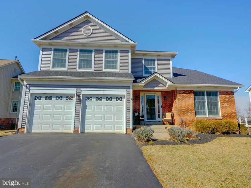 Location, location, location is very important when buying a home. No worries, we have all three here. Minutes to major routes, beautiful community and one of the best lots! Spectacular views of the countryside and mountains are found here with this spacious home in Jefferson. This 3 level colonial has been recently updated with new roof 11/24, new siding, gutters/downspouts 11/24, new carpeting and luxury vinyl planking floors 1/25, gas hot water heater 2023. Inside there are 4 big rooms upstairs with 2 full baths, including the en suite in the primary with double vanities and large soaking tub. The walk in closet is off the bathroom and another closet inside the bedroom providing ample space. Full bath in the hallway serves the other 3 generous bedrooms. The 4th bedroom is currently set up as a loft, open to the living area below but has windows and a double closet, if the new owners want to add drywall to finish the enclosure to make a private bedroom. On the main level the living room has vaulted ceilings and natural light from the front and side windows. The dining room is in the rear but the current owners have switched the rooms for their preferred use. Kitchen is open to the breakfast nook and family room. Family room has a wood burning, full brick fireplace. Remodeled powder room off the foyer. Slider to the deck with the best views of the rear yard, farmland and rolling hills. Fenced rear yard, storage under deck and plenty of room for gardening or outdoor sports. The 2 car garage has plenty of storage and a side door to the covered wood shed with wood for the fireplace or outdoor firepit. The lower level includes the laundry with washer and dryer (2018). Slider to the rear yard. Rough in for future bath and a workshop with 2 workbenches. The covered front porch is just the right size for chairs or seasonal decorations. At the west end of the street, the community park with paths and benches, is so convenient for a nice sunset stroll. The owners have shared some of their favorite photos of the views from their deck but you should come see for yourself! Call your agent and arrange your own private viewing today. A home like this is hard to find and won't last long.