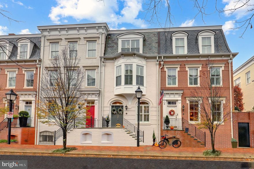 Welcome to the epitome of luxury living in the heart of Old Town Alexandria! Nestled near the picturesque waterfront, this stunning townhouse seamlessly combines historic charm with modern elegance. Boasting an attached 2-car garage, this residence provides the utmost convenience and privacy in one of the most sought-after neighborhoods. With 3 bedrooms, 4 full baths, and 1 half bath, every inch of this townhouse exudes sophistication. The basement level offers a versatile bonus room, perfect for use as an additional bedroom or a home office, providing the flexibility to cater to your unique lifestyle. The living spaces are adorned with two gas fireplaces, creating a warm and inviting ambiance throughout. Stainless steel appliances grace the well-appointed kitchen, elevating both style and functionality. The private patio off the family room invites you to unwind in a tranquil outdoor space, perfect for entertaining guests or enjoying a quiet evening. Parking is a breeze with the convenience of an attached 2-car garage and plenty of street parking for guests. The prime location of this residence ensures a lifestyle of convenience, with shops and restaurants just a leisurely stroll away, making every day an opportunity to indulge in the vibrant culture Old Town Alexandria has to offer. Immerse yourself in the unparalleled luxury and charm of this exquisite townhouse, where the combination of timeless architecture, thoughtful design, and a prime location near the waterfront make it a truly exceptional place to call home. Schedule your private viewing today and experience the pinnacle of Old Town living!