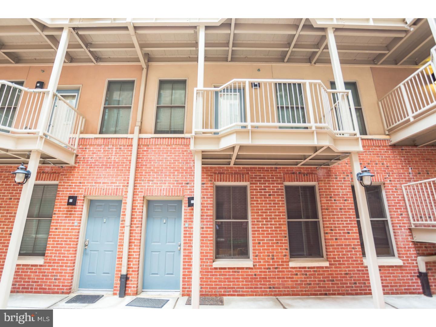 So you want to live in the city?why not choose one of the nicest communities in a one of the most vibrant neighborhoods the city has to offer? The National is a secured gated community in heart of old city and offers lovely well maintained grounds, on-site management office and underground parking. This unit is a rare ground floor townhouse style residence with a private outdoor patio. The walled patio provides privacy and is conducive to a container garden for decorative flowers or delicious homegrown herbs. The townhouse offer bi-level floorpans?the living, dining and kitchen are on the first floor while the bedrooms are situated on the 2nd level. This unit has exquisite upgrades and great space. Welcome a spacious open floorplan comprised of a very generous family room that blends with a lovely defined dining area. Nothing was spared in the chef-grade kitchen: a substantial U-shaped design wows with gorgeous Viking appliances, a brand new Bosch dishwasher, handsome granite counters, and rich wood cabinetry. The back door leads from here to the patio for ideal outdoor dining and entertaining. A huge utility room holds the furnace, washer/dryer and provides extra storage. A large half bath is conveniently located on this level as well. A standard staircase adorned with an elegant runner leads to the second level. A comely full bath featuring nicely tiled floors and a ceramic tub/shower surround, a wood vanity with a granite single sink counter sits in the hallway across from the guest room. The guest room is sizable with ample closet space. The Master suite is nothing less than stunning: custom coffered ceilings with hidden lighting surround the 'king sized' space. Double closets along one wall plus a single closet on another one provide plenty of storage. The attached master bath has a rich wood double vanity, topped with a granite counter enclosing two porcelain sinks. The glass shower is adorned with ceramic and glass tiles for an elegant touch. Old City defines the ideal city lifestyle: The Arden, Painted Bride and the Fringe Festival feed the performing arts, celebrity chef restaurants are well represented, casual cafes, boutiques, art galleries and design houses line the streets. Museums, The Historic Village, the Constitution Center are all nearby and famous Penn's Landing with its numerous festivals lines the east border. It is a transportation hub for easy access around, into and out of the city.