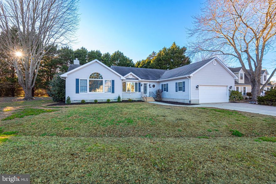 Beautifully renovated 3-bedroom, 2-full-bath home situated on a just-under-½-acre corner lot in the sought-after St. Martin’s by the Bay Community. This light-filled residence features a brand-new kitchen with stainless steel appliances, crisp white cabinetry, butcher block countertops, a tiled backsplash, and a center island with space for dining and gathering.The spacious primary suite offers stylish navy accents in the private en-suite bath, new carpeting, and direct access to a private deck—perfect for morning coffee or evening relaxation. Two oversized guest bedrooms share a gorgeous, newly updated guest bathroom.
The living room is a true highlight with vaulted ceilings, skylights, and large bay windows that flood the space with natural light. A screened porch extends the living area and overlooks a generous, tree-lined backyard—ideal for entertaining or enjoying peaceful outdoor living.
Additional features include a finished 2-car garage, fresh landscaping for outstanding curb appeal, and a quiet, welcoming neighborhood close to the bay and local amenities including community pool, marina and common areas. 
Professional Photos to follow - Open House Saturday, February 7, 10:00-2:00