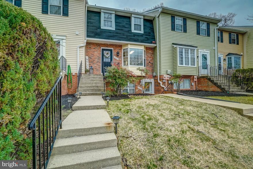*Buyer got cold feet!* This amazing 2 Bedroom, 1.5 Bathroom townhouse is located in the highly sought-after Arbory Community located in Laurel, MD and is situated perfectly for commuters close to major highways and public transportation. The home has been totally renovated with high-end features, new HVAC in 2022, and all furniture in the home conveys! Walking through the front door you will immediately see the Luxury grade large plank flooring and fully renovated half bath. Heading into the updated fully equipped kitchen you’ll find the best finishes such as a bay window, granite countertops, subway tile backsplash, new cabinets, and stainless-steel appliances. Walking through to the dining/living room you’ll find a two-sided fireplace with customized penny tile, a large sectional couch, and plenty of room on the private back deck.  Continuing upstairs there is new carpeting, wood blinds, a beautifully renovated bathroom, and two EXTRA Large bedrooms. Finally, through the walk-out basement, past the included washer and dryer is the private back patio finished with a privacy fence and brick patio that backs to woods!