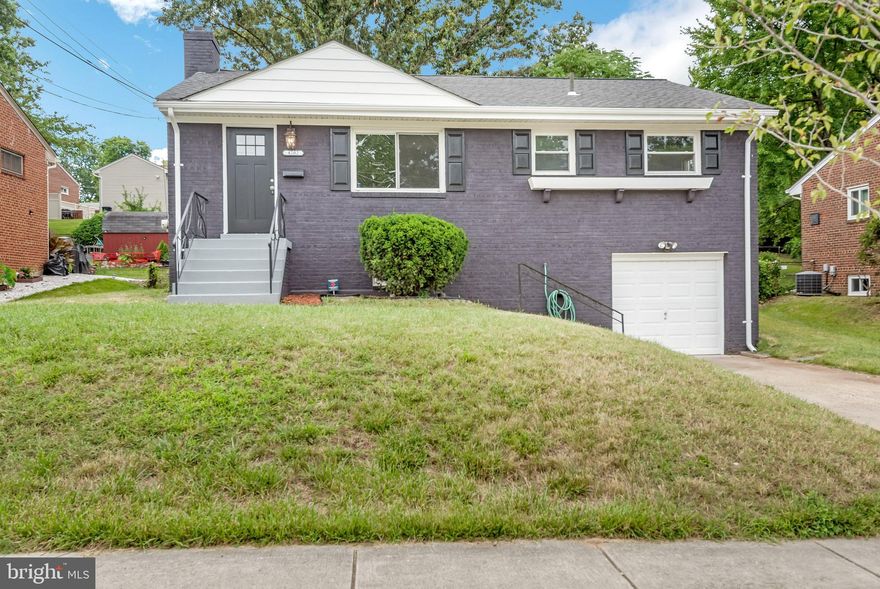 Welcome to this 3 bedroom 2 bathroom home in Hillcrest heights. Walk into a light a bright family room with wood floors and recessed lighting. Easily move into the kitchen with plenty of counter space, cabinet space and stainless steel appliances including french door refrigerator and gas stove. 3 spacious bedrooms with fresh carpeting complete the level for easy living. The finished lower level is perfect for additional living space or rec room and includes the 2nd full bath and a cozy fireplace. A separate laundry room is perfect for storage. Easily entertain in the spacious back yard with patio. Never worry about parking with the one car garage and driveway.  Close to major highways/Capital Beltway, Metro, Andrews AFB, shopping, groceries, restaurants, entertainment, National Harbor, and Downtown DC.