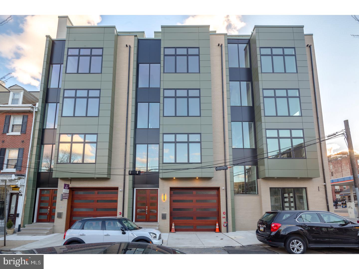 Spectacular new homes with every amenity imaginable at only $342/sf! Riverside Luxury Townhomes have 5,200+ square feet of living space built by a meticulous custom home builder. Features include 2-car garages, approved tax abatement's ($1044 /2016 annual taxes), theater rooms, a 6-stop elevator, 3 zoned HVAC systems, smart home technology systems and 4 outdoor spaces including an amazing roof deck. Each home has 4 to 5 bedroom layouts plus bonus rooms, five full bathrooms, and one half bathroom. The master bedroom suites occupy an entire floor of each home and are to die for! The master baths are enormous with designer oval soaking tubs, open tiled European shower rooms, perfect tile choices and dual vanities crafted by Porcelanosa. The master bedroom levels also have two walk in closets with custom shelving and large sun-drenched sleeping areas with over-sized windows. The kitchen is a true masterpiece with Poggen Pohl cabinetry, Silestone counters, top of the line Miele appliances and a huge island for entertaining and dining. These homes are an example of expert old world craftsmanship that is difficult to replicate, with accent lighted crown moldings in the kitchens and coffered ceilings in the living areas. The living rooms also have gas fireplaces, several floor to ceiling windows, elegant hardwood floors and designer wood staircases with iron and glass railing system right out of Architectural Digest magazine. Too much to mention in one short summary!! The lower levels are accentuated by theater rooms, a full bathroom and home gym. The smart home system includes a security alarm, video intercom system and a home automation system. Each bedroom is spacious and has large closets and tons of natural light. Every bathroom is unique with designer fixtures and perfect tilework. The craftsmanship in these homes is stunning. The roof decks are over 60 feet high and have unobstructed views of the Delaware River and Ben Franklin Bridge to the East and of the city's amazing skyline to the West. These enormous roof decks are properly supported to hold a full size hot tub, and are equipped with gas lines, electric and running water. Riverside Luxury Townhomes are located in Philadelphia's most historic neighborhood. Walk the cobblestone streets to some of the city's best restaurants and boutiques. The homes are bordered by a park and have easy access to major thoroughfares.