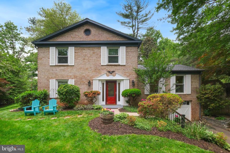 Discover 2295 Dunster Lane, a classic brick split-level home ideally situated on a 0.27-acre corner lot in the desirable Potomac Woods community. Offering 2,788 total square feet with four bedrooms, two full bathrooms, and a powder room. Highlights include a new roof in 2026, hardwood floors throughout the main and upper levels, recessed lighting, an updated kitchen, updated bathrooms, built-ins, and abundant windows that fill the home with natural light—all within a versatile layout that adapts easily to everyday life. A stone retaining wall and mature landscaping create a welcoming approach. Inside, the foyer is finished in flagstone and leads up to the living room and dining room.  At the center of the home, the stylish updated kitchen boasts stainless steel appliances, a gas range, granite countertops, recessed lighting, tile backsplash, and ample cabinetry for storage and prep space. The adjacent breakfast area provides table space framed by a large window overlooking the backyard. The kitchen and breakfast area open to a walk-out family room anchored by a cozy wood-burning fireplace set in a brick accent wall, built-in shelving, and French doors leading to the patio and backyard. Just off the family room is a private office/5th bedroom with access to the powder room. The upper level offers four bedrooms and two full bathrooms. All bedrooms include ceiling fans and hardwood floors. The primary suite has a walk-in closet and an updated en-suite bathroom with a glass-door shower, contemporary vanity, and stylish tile finishes. The hall bathroom has also been renovated and includes a tub-shower combination. The lower level adds valuable flex space with a mudroom, laundry room, storage space, and direct access to the attached garage. Additional storage can also be found in the attic. Outside, the backyard provides a comfortable setting with multiple access points from the house, a flagstone patio and greenspace - perfect for relaxing or entertaining. Potomac Woods is known for its established setting, tree-lined streets, and convenient location close to parks, shopping, dining, commuter routes, and everyday amenities. Enjoy easy access to nearby schools, recreational facilities, and major transportation corridors while living in one of the area’s most sought-after neighborhoods.