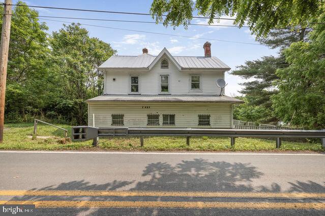 7401 Watersville Road in Mount Airy is back on the market! This home, originally built in 1900 offers a rare opportunity to restore, restructure, renovate or raze and rebuild! Could be a fabulous investment opportunity or, make it yours. Being an estate, there is not much known about the home, but there is evidence of updates throughout the years, including: ductwork; units for dual-zoned central heat and air; relatively newer water heater and hook-up for both washer and dryer, to name a few. Property needs work and will not likely qualify for any standard financing. Currently there are no working utilities. Owners have no info on current condition of well and septic systems. Please do not go out onto deck! Use caution in general, both inside and out! Have flashlights. Property being sold As-Is. Estate will not make repairs. Please feel free to call listing agent with any questions!