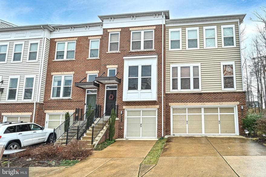 ***FOR RENT***Welcome to this elegant townhome located in the highly desirable Brambleton community. Boasting three fully finished levels, this home is the epitome of comfort and convenience, complete with 3 bedrooms, and 3 1/2 bathrooms, and ready for you to move in. The residence features a host of upgrades and a well-designed open floor plan. Step out onto the oversized deck from the main level and enjoy the serene views of a fenced rear yard backing mature trees, perfect for relaxation or entertaining guests. The main level is adorned with beautiful hardwood floors and includes a spacious living room, a dining room, and a half bath. The heart of the home is the kitchen, equipped with gas cooking, stainless steel appliances, and an inviting eat-in area with doors that lead to the expansive deck. The upper level is dedicated to rest and rejuvenation, highlighted by the primary suite complete with double door entrance, ample closet space, and a superb primary bath featuring dual sinks, a soaking tub, and a shower. A second sizable bedroom and a full bath round out this floor. On the lower level, find a third bedroom offering a level walkout to the pleasant fenced backyard. Parking is a breeze with a 1 car garage, driveway, and additional guest parking available directly across the street. This wonderful home is a part of the Briar Woods High School Pyramid, adding to its appeal for families looking for quality education options. The Rent fee covers all the amenities offered in the Brambleton HOA and includes lawn mowing and cable. Be sure to check out the pools, sports fields, tot lots, tennis, basketball, and volleyball courts and so much more! Minutes to major roads, Dulles Airport, Metro, Shopping, Restaurants, and Schools!