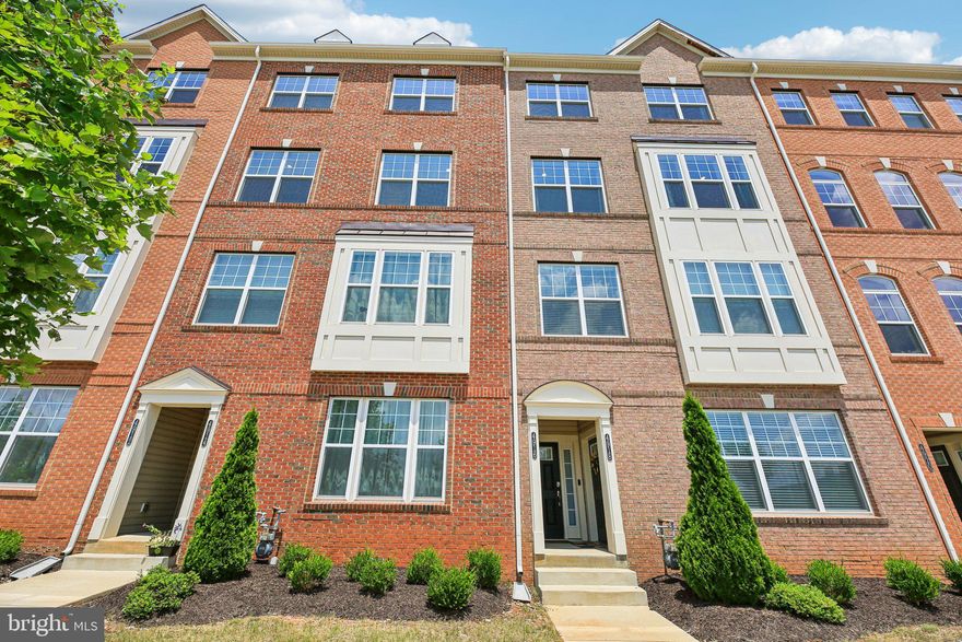 Welcome to 4916 Macdonough Place — a beautifully appointed bi-level townhome offering the rare convenience of a private in-unit elevator. 

Step into the expansive main floor where an open-concept design highlights a chef’s kitchen with a grand island seating five, stainless steel appliances, and custom cabinetry. Adjacent to the kitchen, enjoy your built-in coffee and wine bar—perfect for morning routines or evening gatherings.

The light-filled living space flows seamlessly into two separate, spacious sitting areas framed by large windows, while luxury vinyl plank flooring extends throughout. Retreat upstairs to your primary suite oasis, complete with a huge walk-in closet and a spa-inspired bathroom featuring a dual vanity, soaking tub, and separate glass-enclosed shower.

Enjoy the ease of townhome living with rear-entry 1 car garage and a top balcony. Whether you value accessibility or crave luxury conveniences, this home delivers. With upgraded finishes, elevator access to all floors, and generous storage, this residence is truly move-in ready.

Located in a vibrant community close to shops, dining, and commuter routes—don't miss the opportunity to own one of the few homes in the area with a private elevator!