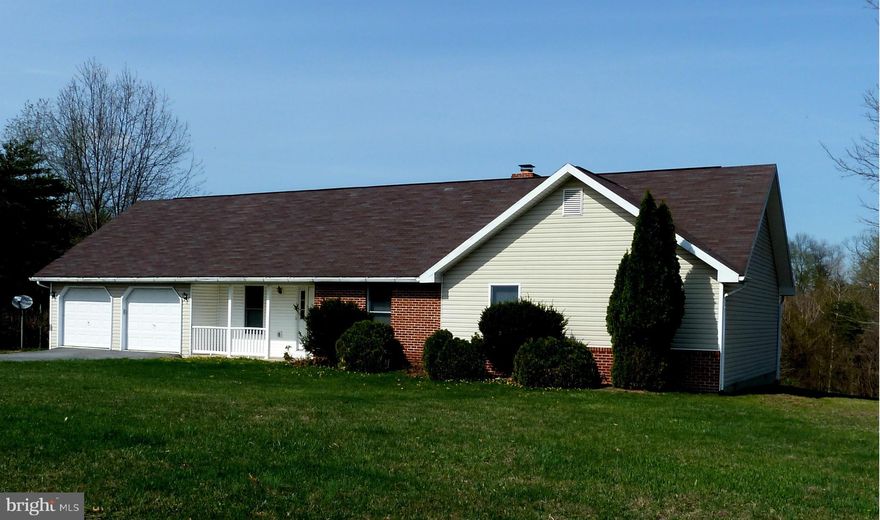 Reach for this solidly built LARGE rancher in so hard to find country setting/small subdivision.Enjoy YOUR 2.5 acres which backs to woods, watch wildlife from your rear deck or cozy brkft nook. All 4 bedrms are spacious.New wood floors& ceramic tile almost throughout entire home. Lg. laundry rm w/storage off garage ideal! New stove & dishwasher. Properties like this aren't for sale often!Brick FP.