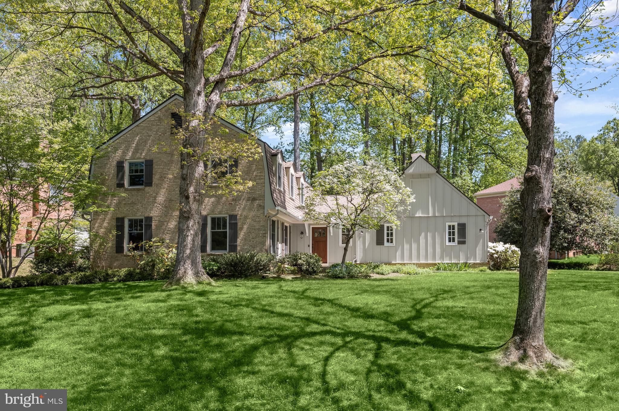 Residing on a tree-lined, serene street surrounded by greenery, 9413 Winterset Drive will charm passersby and residents, capturing both traditional elegance and modern design. This welcoming Colonial presents 4 Bedrooms, 4 Full Baths and 1 Half Bath across 3 crafted levels and 3,905 square feet of living space, including multiple recent renovations, Main and Upper Level hardwood floors, and recessed lighting throughout.
After stopping to admire the lush and manicured Front Yard, residents and guests alike are greeted by the expanded Entry Foyer, including chair railing, wainscotting, a modern chandelier, a coat closet and pocket door to the added mud entry. The Mud Entry, leading to the attached, 2-Car Garage, offers bench seating, slate tile flooring, cabinets with quartz countertop and coat hooks. The cozy Living Room boasts lovely crown molding detail and graciously opens to the Dining Room, showcasing crown molding as well as an updated chandelier. The Family Room is sure to impress, presenting stately beamed ceilings, a wood-burning fireplace with stone surround, and a triple window overlooking the Rear Yard’s greenery; spend quality time with loved ones in this stunning room. The Office is the ideal work-from-home space, including built-ins, folding doors to the Family Room, access to the Foyer and a sliding glass door to the Rear Patio. The Gourmet Island Kitchen will delight any at-home chef; boasting custom white cabinetry, Soapstone counters, Carrara marble tile backsplash, a Shaws porcelain farmhouse sink, a pantry cabinet, breakfast bar seating and pendant lighting. The Breakfast Area includes beautiful bay windows with interior shutters, an updated chandelier, a beverage refrigerator and a Wet Bar with glass display cabinets; enjoy busy and quiet mornings in this cheerful room. The Office Nook/Workspace offers a built-in desk, access to the Rear Yard and a Laundry Closet, including stacked, front load washer and dryer, countertop workspace, cabinets and shelving. The Main Level’s offerings are complete with the renovated Powder Room, boasting crown molding, a modern vanity and updated lighting.
Ascending to the Upper Level, double doors open to the Primary Bedroom, showcasing an outfitted walk-in closet, a triple window overlooking the Rear Yard and an en-suite Primary Bath. The spa-like Primary Bath presents tile flooring, 2 vanities with marble tops, vanity lighting, a free-standing soaking tub, a tiled stall shower with bench seating, a rain shower head and hand-held shower head; unwind and relax in this peaceful oasis. The Second Bedroom offers an en-suite Full Bath, including octagonal tile flooring, a single vanity with modern vanity lighting and a stall shower with a frameless glass door. 2 Additional Bedrooms, one featuring attic access and both including lighted ceilings fans, and the Full Hall Bath, complete with tile flooring, a tub shower with tile surround, and a hand-held shower head, complete the Upper Level’s offerings.
Descending to the Lower Level, the Recreation Room awaits, boasting LVT flooring and a deep under stair closet and second closet; host movie and game night in this inviting room. A Full Bath with tile flooring, a stall shower and vanity, and an unfinished Storage Room complete the Lower Level’s offering.
Enjoy the gorgeous spring and upcoming summer weather on the slate Rear Patio or the gazebo with screened curtains, all included in the fully fenced, spacious Rear Yard with stone retaining walls.
Located in the friendly Winterset Neighborhood, near Trailridge and Fallsberry Parks and Country Glen Club, and easily accessible to Cabin John Village and Potomac Village, 9413 Winterset Drive offers residential tranquility in a coveted location. Enjoy a visit today!