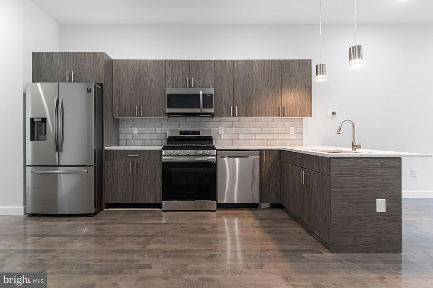 Are you a hungry investor? Perhaps an owner-occupant looking to house hack? Now's your chance to purchase a turn-key, income-producing asset nearby Temple University with projected rental growth. From toasted oak hardwood flooring and contemporary kitchens to central air and open concepts, each unit offers desirability for owners and renters alike. The unit mix includes two (2) 2 bedroom, 2 bathroom units and one (1) three bedroom, 3 bathroom unit all equipped with in-unit laundry with option of private outdoor space. The property is also located within a Qualified Opportunity Zone, providing potential tax advantages for investors, and includes approximately six years remaining on a tax abatement. Walking distance to Temple University, Cousin's Supermarket, Human Robot Beer, Luna Cafe, the Broad Street Line. Easy access to all the happenings in Fishtown, Broad St/611, and Girard Ave. Approx 5 years left on the abatement. Owner-occupants have the option of putting 5% down on a conventional loan. Message for more info (and tour today)!