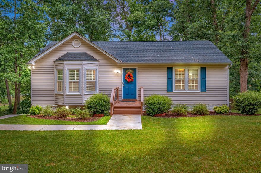 Gorgeous home on the water in amenity filled Lake Land'or. Enjoy the outdoors with family and friends from your own private dock! This home has it all. Gorgeous wood floors throughout main level.  A cozy living room has plenty of space for game night with the freinds. The primary bedroom leads to a ceramic shower with granite vanity. Plenty of space in the kitchen with ceramic tile, stainless steel appliances and a door that leads to a trex deck and fenced in back yard.  Basement is finished with bathroom and another bedroom NTC. If you are looking for a peaceful sanctuary this is it!