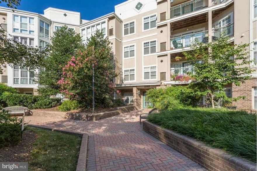 Charming 2br 1bath garden style condo in super convenient Savoy Park. Walk-in closet in master, Gorgeous outdoor space. OPEN kitchen with full-sized W/D. Second bedroom or office with ample storage & shelving. Convenient garage parking steps from the elevator, extra storage, bike storage, pool and gym. WALK to Target, restaurants, shops. Easy access to bus routes, RT7, 395, and more!