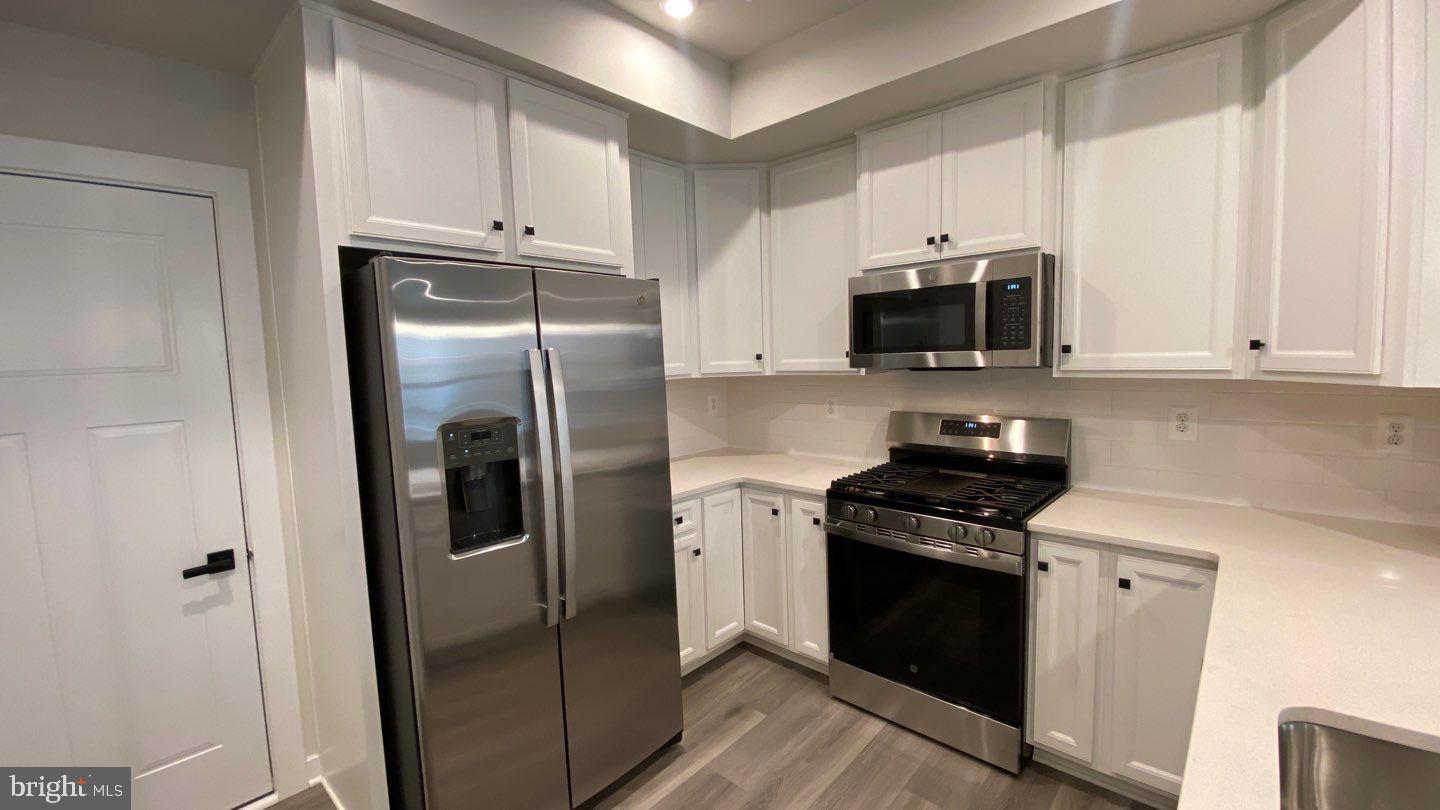 TOWN SQUARE ROW - Residential Lease