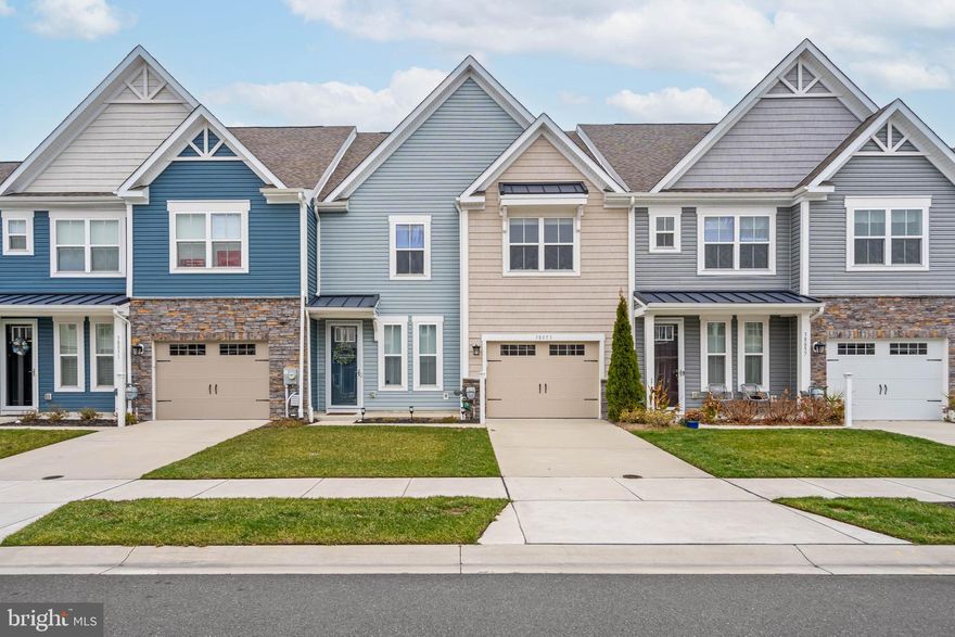 Step into this beautifully upgraded, fully furnished townhouse  (with few exceptions) in the highly sought-after Bishops Landing community. If you are thinking of new construction, compare the true all-in cost and timeline—then come see the advantage of buying a pristine, seldom-lived-in home that is beautifully furnished and ready for you today! Completely move-in ready, this home offers a seamless blend of style, comfort, and functionality. Inside, luxury vinyl flooring flows throughout the main level, accentuated by granite countertops, stainless steel appliances, soft-close cabinetry, and elegant pendant lighting. The open-concept design is perfect for entertaining, while thoughtful upgrades like custom paint, luxury window treatments, intricate trim work, a paver patio, screened porch, and lush landscaping add a touch of sophistication.
Upstairs, the primary suite impresses with a spacious walk-in closet, a tiled bath, and a walk-in shower. A versatile loft provides additional living space, ideal for guests, a home office, or a cozy retreat. Two generously sized bedrooms, each with walk-in closets, share a beautifully tiled full bath with a tub/shower combo. A conveniently located laundry room completes the upper level.
Located just five miles from Bethany Beach, this home offers the ultimate coastal lifestyle. Weekly rentals are permitted, making it not only a dreamy vacation getaway but also a fantastic investment opportunity. Bishops Landing boasts resort-style amenities, including three swimming pools, two clubhouses with fitness centers, tennis and pickleball courts, a beach shuttle, dog parks, playgrounds, and more. A fully paid Current Home Warranty, valid through March 15, 2028, transfers to the new owner for added peace of mind.  Don’t miss your chance to own this exceptional home—schedule your tour today and start living the coastal dream!