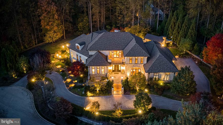 Live authentically. Experience this architectural marvel designed by Patrick Sutton. As featured in his book, "Storied Interiors, The Love of Travel, Patrick stated, "A home that has been shaped by a deep appreciation of life’s offerings and a passion to share them." A breathtaking piece of living sculpture.
Tucked away in a gated enclave, relish the quiet sense of arrival. A sensory celebration unfolds in the reveal. Cross the threshold and experience aesthetic richness like never before. The textures layered with bespoke lighting and curated architectural details create a symphony of artistry. A sense of openness pervades the space, soaring ceilings and sleek lines that captivate the eye. Sublime primary suite. The lower level is transcendent. Moroccan touches accent modern European sensibilities. Wine room, the ultimate art-deco theater, basketball court, dedicated guest suite and elevator access. The zenith of outdoor living awaits.
It's not just a dwelling; it's a work of art, a sanctuary, and a testament to the beauty of architectural innovation. Cultivate your existence. The art of uniting human and home.