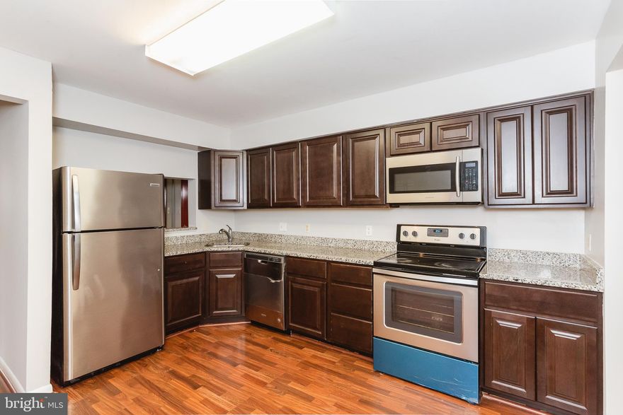 Back on the market after new paint and carpet.  Walk in and you'll instantly feel at home in this beautifully renovated bright 2BR/2BA condo with tons of fresh upgrades. An abundance of natural light,   upgraded kitchen. ample parking, and a deck overlooking green space! This property is a delightful planned community which is classically designed and perfectly situated to let you take advantage of the county's excellent schools and activities.  Close to 695/83. Please follow all current CDC guidelines when visiting.