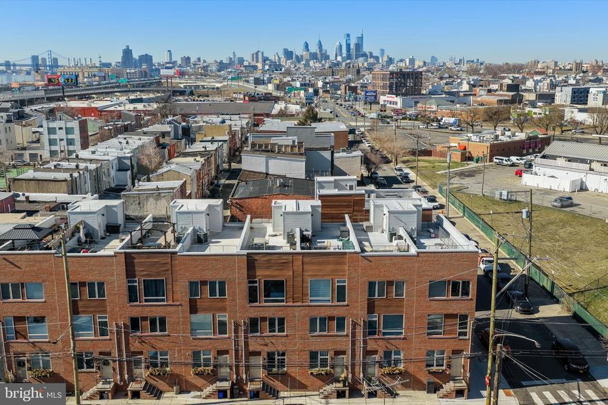 With roughly 3000 square feet of indoor living space, a dedicated parking spot in a private lot, easily available street-parking, a finished rooftop for your urban garden & summer dinners, easy access to 95, two plus years remaining on its tax abatement, and walkability to all of Fishtown’s hotspots while maintaining a neighborhood feel, 2650 E Huntingdon Street has everything you’ve been looking for.  The main level of the house benefits from an open floor plan bookended by street parking out front and your dedicated parking spot just a step outside of the kitchen slider for unloading the groceries with ease.  The kitchen is perfectly set up for weeknight dinners or entertaining friends and family on the weekends with its four-person breakfast bar and ability to easily accommodate a large farmhouse table.  On the 2nd floor, you have 2 generously sized bedrooms with large closets that share a nicely appointed hall bath, and everyone is sure to love the laundry’s location on this floor as well.  On the 3rd floor, you have a beautiful primary bedroom with ensuite bathroom and a large walk-in closet that enjoys plenty of natural light.  The 3rd floor is rounded out by a hallway half bathroom that services the rooftop terrace for those perfect spring days that call for enjoying the beautiful views of Philly’s notable skyline.  The lower level of the house is extremely flexible with its additional half bath, allowing this space to become your home office, gym, playroom, homework room, general hangout for movies and relaxing, extra guest space…you get the idea, it’s hugely usable space for anything you might think of.  The home clearly offers a wonderful living style all while being  easily accessible to Philadelphia International Airport, the stadiums, & Center City.