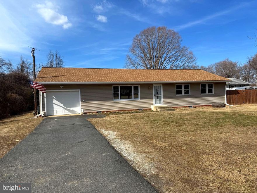One level living between Centreville and Chestertown! Convenient location for easy commuting (minutes from 301).  3 bedroom and 2 bathroom Rancher with attached one car garage and room for a workbench and/or extra storage.  Great layout with nice size bedrooms, separate dining room with French doors that could also be a bonus room for kids or an office/library for adults.   Large rear deck overlooking deep backyard that could be fenced in.  Gas fireplace and tankless water heater.  New roof in 2021. Crawl space insulated and dehumidifier installed 2022.  Come start your garden and make this house your home!