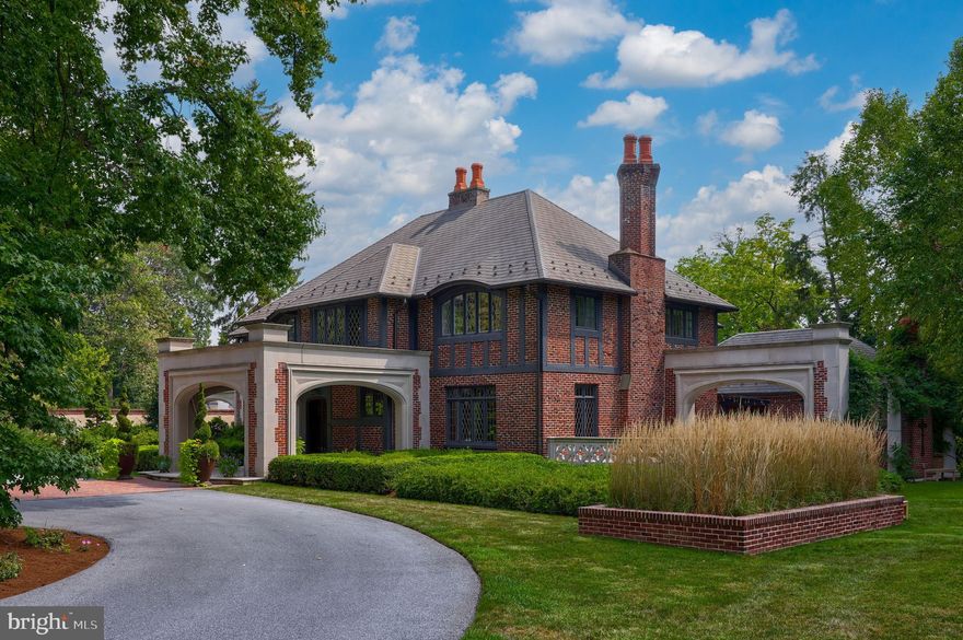 Welcome to Shadowlawn/ This English Manor was built in 1937 for the Hager family and completely remodeled and added to, in 2011 by current owner/ The main home is solid brick and Indiana Limestone/ Shadowlawn has a classy blend of old charm and modern amenities/ Synthetic slate roof/ Front limestone Portico/ Original solid oak front door/ 1st floor has 9' & 10' ceilings, oak and Mahagony trim and oak flooring/ Custom kitchen with granite, high end appliances and built in eating area/ Side Porte-Cochere gives covered outside access to kitchen for catering events/ Custom butlers kitchen with high end appliances and lots of granite/ Library with granite fireplace, tin & coffered ceiling/ Living room with limestone fireplace/ Formal Dining room/ Grand Hall with 2nd staircase/ Huge family room/ 2nd floor laundry with granite tops/ Chestnut floors/ 4 ensuite bedrooms and baths/ Owners suite has a sitting room and balcony/ Travertine showers and floors/ Lower level with full kitchen/ Theatre/ Billiards room with limestone fireplace and tin & coffered ceiling and a Grand outside entrance fitted in limestone/ game room/ wine cellar and tasting room with stone arch ceiling/ Geothermal, radiant, floor heat throughout main home and some patios and sections of driveway/ Detached pool house has full kitchen, bedroom, loft and full bath/ Additional outside full bath for pool guest/ heated pool/ Incredible, professional hardscape and landscaping with English gardens, brick flower beds, water features, limestone, flagstone, and brick patios/ Extensive exterior lighting/ This secure, private, compound has a front and rear driveway with gates, wrought iron fencing and a brick and concrete wall situated on 3.1 acres just outside of Lancaster city