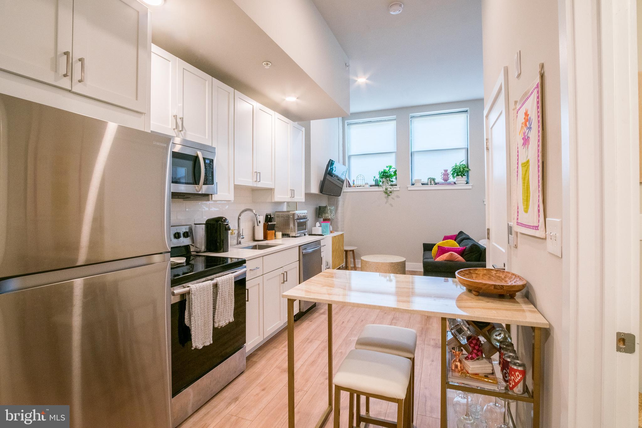 *Available NOW!*
Welcome to the Smith School! Units feature amazingly high ceilings and beautiful floor to ceiling windows, letting in tons of natural sunlight and modern kitchens with quartz counter tops, white shaker cabinets against subway tile back splash, a garbage disposal and a stainless steel appliance suite. The open floorplans allows for ample living and dining space as well. The Apartment Homes also feature sleek bathrooms with neutral tiling, a large vanities and a shower/tub combination. Lastly, enjoy hardwood floors, mini split system heating/cooling, recessed lighting and in-unit laundry! All tenants will have access to the two outdoor spaces (over half an acre combined!) on ground floor and mezzanine patios, and roof deck with stellar skyline views! Located at 19th and Wharton in Point Breeze, you’ll be minutes from the OCF Coffee House, American Sardine Bar, Graduate Hospital, East Passyunk and MORE!
Lease Terms: Generally, 1st month, and 1 month security deposit due at, or prior to, lease signing. Other terms may be required by Landlord such as last month’s rent upfront. $65 application fee per applicant. Residents Responsible for Electric Usage & Flat Monthly Water/AC/Heat fee of $100. Additional fees or requirements may be applicable for units with Homeowners or Condo Associations. Landlord Requirements: Applicants to make 3x the monthly rent in verifiable gross income, credit history to be considered, no evictions within the past 5 years, and must have a verifiable rental history with on-time rental payments. Exceptions to this criteria may exist under the law and will be considered. Cosigners will be considered.
*Price reflects the net effective rent when a 1-month credit is applied at $1,195/mo.
*Sorry, no cats
*1 dog <45 lbs permitted with owner approval + $50/mo pet fee
*Resident responsible for electric and $100/mo flat fee for water + heating/cooling
*Pictures are of a similar unit in the building