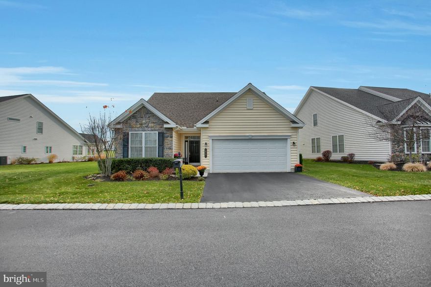 This Washington II resale is in move in condition. Located on a premium oversized lot with landscaping on the sides of the home is within walking distance to the Club House and all the outdoor amenities. Ideal open floor plan with LR, DR. Great Room, The gourmet kitchen, granite counters with bar has double wall oven, under cabinet lighting and wine ref.  Dinette Area has a window seat with piano hinge for additional storage.  Great room off the kitchen has surround sound. The Master Bedroom was extended for sitting area. 2nd. bedroom /den is also on first floor. 1st floor laundry with cabinets, pantry under stairway. 2nd floor offers loft and 3rd. bedroom. Storage room has been finished with carpet and molding. Enjoy your morning coffee or evening happy hour in the screened porch or paver patio which backs up to the walking path and open area. Check out all the amenities that TOA has to offer.