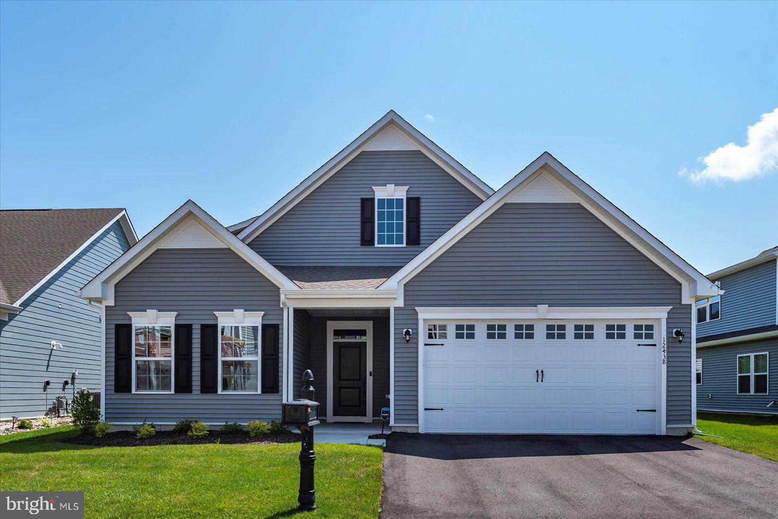 This inviting 3-bedroom, 3-bathroom home features an open floor plan with recessed lighting, a spacious 2-car garage, a cozy back porch, and a large yard—perfect for relaxing or entertaining. Ideally located just a short stroll from the community center, fitness center, playground, and pools, this home offers easy access to top-tier amenities. Enjoy a 10,750 sq. ft. clubhouse with a kitchen, entertainment space, game room with pool table, gym, and an indoor pool open year-round. The outdoor pool is open daily in summer from Memorial Day to Labor Day. Love the outdoors? You'll find tennis courts, nature trails, a crabbing pier, and a 1,300-ft community pier stretching into the Bay toward Assateague Island. There's also convenient kayak/canoe storage near the launch area. Blending comfort, style, and convenience, this home offers the perfect setting for year-round enjoyment.