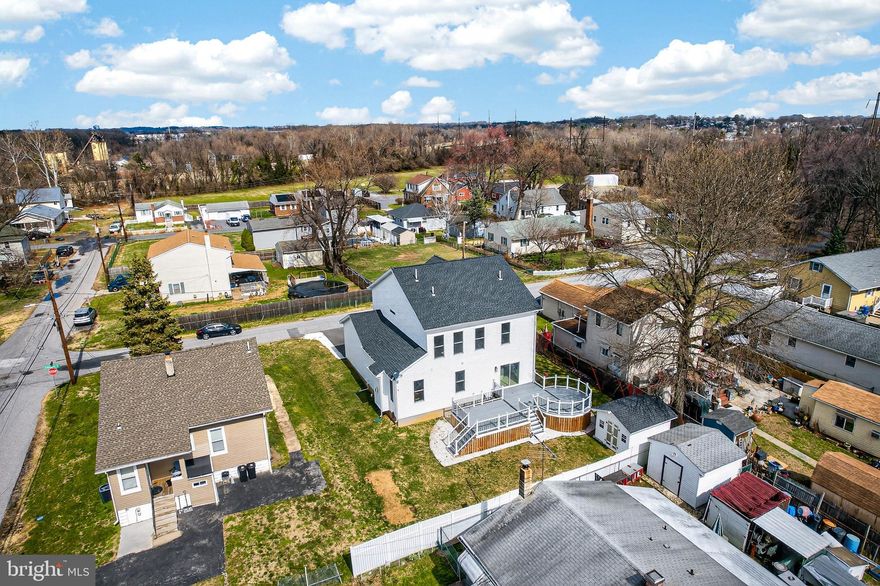 This home offers the rare opportunity to be only the second owner. Built in 2023, this impressive two-story residence features 4 bedrooms, 3.5 bathrooms, and a convenient attached garage. Thoughtfully designed for both comfort and entertaining, the home showcases spacious open-concept living areas filled with natural light. Step inside from the inviting front porch into a bright and airy interior featuring neutral tones, high ceilings, recessed lighting, and beautiful hardwood flooring throughout the main level. Abundant windows enhance the warmth and openness of the space. The main level offers multiple living areas, a powder room, dining spaces that flow seamlessly together. Glass sliding doors lead to the backyard, creating the perfect indoor-outdoor lifestyle. The gourmet kitchen is a true highlight, featuring stainless steel appliances, white cabinetry, quartz countertops, a range hood, a stylish island, and a pantry for additional storage. Upstairs, you’ll find four spacious bedrooms, each with ceiling fans and generously sized closets. The luxurious primary suite boasts double-door entry, a tray ceiling, a walk-in closet, and a spa-like five-piece en-suite bath. The fully finished walk-out basement, complete with a separate entrance and full bathroom, offers exceptional versatility, ideal for a recreation room, guest suite, home office, or studio. Step outside to enjoy the modern oversized deck, perfect for relaxing or entertaining, along with a storage shed for added convenience. Schedule your private tour today and take advantage of the rare opportunity to own this exceptional home as only its second owner. HOME WARRANTY AVAILABLE