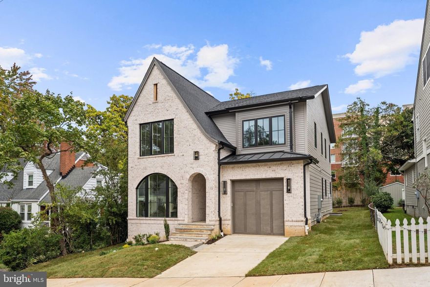 *Builder offering Financing Incentives - Interest rates starting at 4.99% for loan amounts up to $1.5M, other programs available for higher loan amounts, starting at 5.125%. Builder assistance available for qualified buyers. Limited-time offer. ** Introducing The Oakley, a beautifully crafted residence by Arlington's premier luxury builder Classic Cottages. This new construction home perfectly balances contemporary sophistication with enduring charm, located in renowned Maywood. This meticulously designed 4-bedroom, 4.5-bath home offers an ideal blend of style, practicality, and comfort. Inside, you'll discover an open layout that effortlessly unites the main living spaces, creating a warm and welcoming environment for everyday living and special gatherings. The kitchen, a culinary enthusiast's haven, boasts premium stainless steel appliances, Thermador appliances, Elegant quartz countertops, abundant cabinetry, wood floors throughout and a generously sized central island. The owner’s suite serves as a peaceful sanctuary, featuring a spacious walk-in closet and a luxurious bathroom complete with dual sinks, a soaking tub, and a separate shower. Secondary bedrooms are thoughtfully designed, offering plenty of natural light, storage, and en-suite conveniences. The finished lower level adds versatility with a recreation area, a wet bar, an exercise room, additional storage, and a guest suite with a private bathroom. Enjoy outdoor living on the screened porch, providing a tranquil outdoor escape, perfect for unwinding or entertaining. Every detail of this home is curated with high-quality finishes and contemporary features to create a refined and inviting living experience.. Close to neighborhood dining, 1 mile walk to Ballston and Clarendon Metros, Lee Heights Shopping, all major commuter routes, 66, metro bus line, and so close to DC. Call to Schedule a Tour!