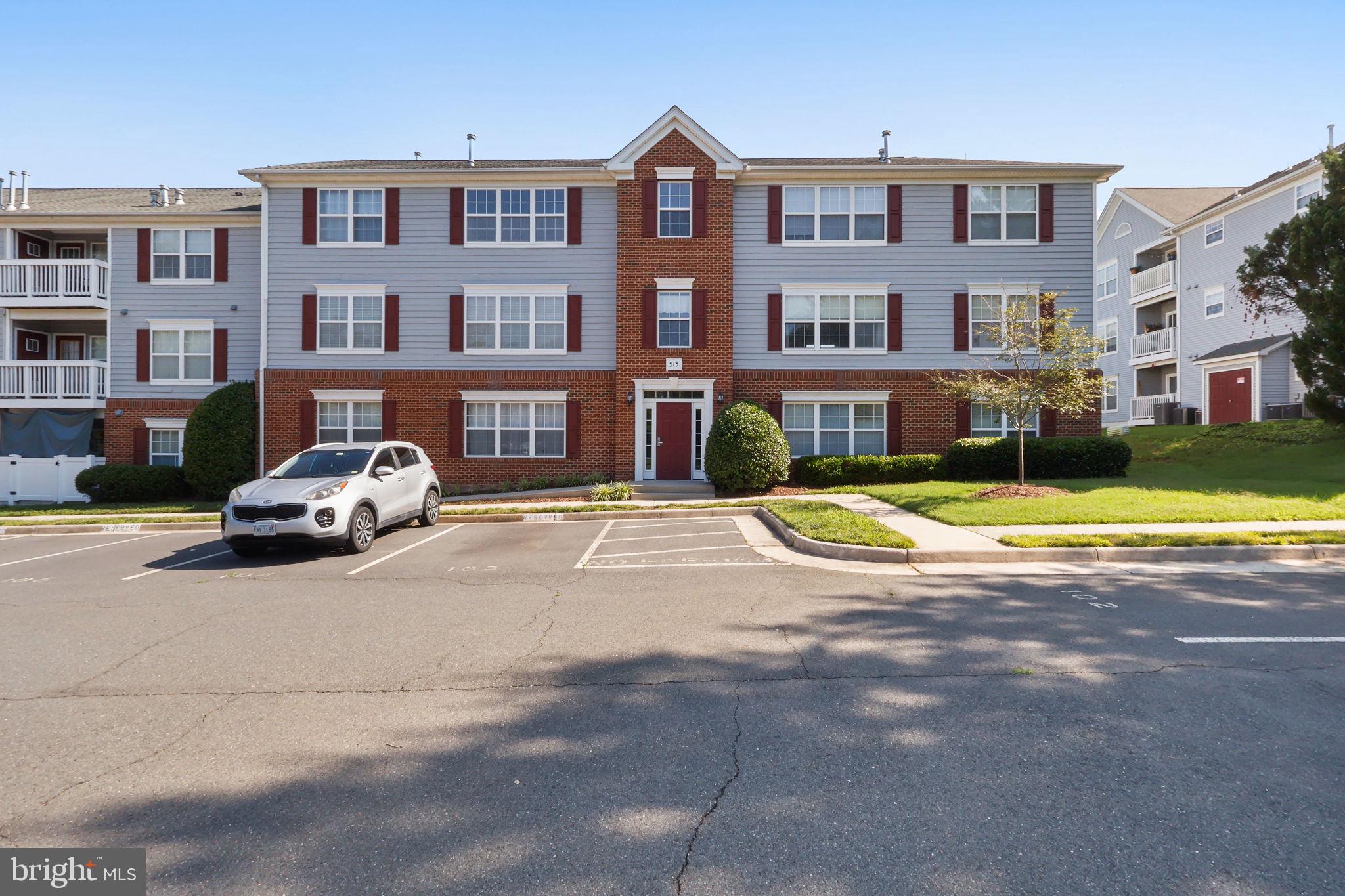 Top-floor unit with vaulted ceilings and a gas fireplace offers a spacious, open layout with great natural light. Thoughtfully designed with bedrooms on opposite sides of the living area for added privacy—each with oversized walk-in closets. Durable LifeProof flooring throughout adds style and easy maintenance. The kitchen features gas cooking, a corner pantry, and a newer washer and dryer conveniently tucked off the kitchen. Enjoy a covered balcony overlooking open common space. Easy access to Route 7, the Greenway, and just minutes to charming historic downtown Leesburg.