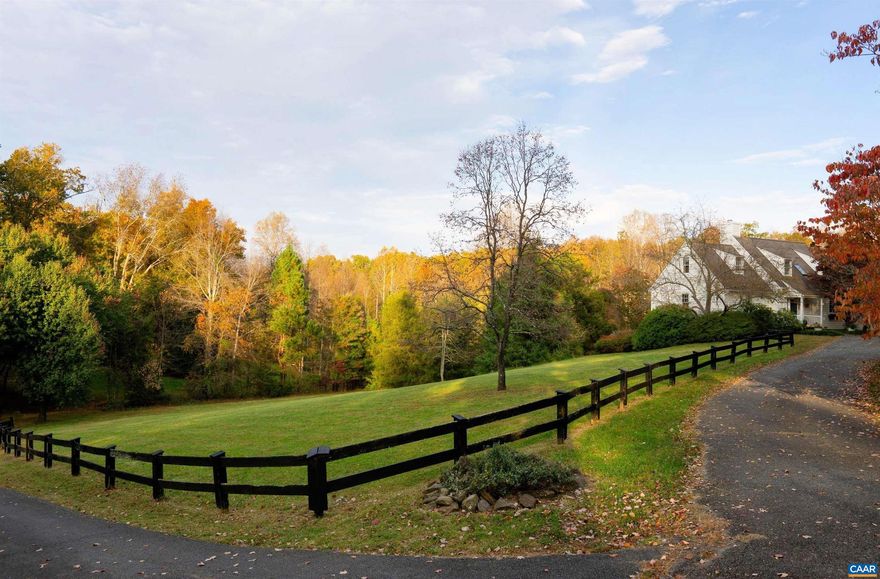 Rare opportunity to own a 'little slice of heaven' in desirable Free Union. One of a kind, architect designed. First time on the market since built; one owner. Main floor owner's suite with walk-in closet, updated en suite bath, sliding doors walkout to back deck with view of property; the perfect spot for morning coffee. Updated kitchen, wood burning fireplace in the great room, oak hardwood floors, custom built-ins throughout, and plentiful natural light with three more pairs of sliding glass doors. Charming second floor has two more bedrooms, plus a bonus room with built-ins and spacious full bath, all with oak or bamboo flooring. Fully finished light-filled basement boasting two add?l bedrooms and updated full bath and large laundry w sink, plus three more pairs of sliding glass doors opening onto brick paver patio, as well as renovated home office / workshop with custom interior Dutch door and separate exterior French door entrance. Abundant wildlife and incredible views from the full length deck overlooking open field, woods, sledding hill and spring fed pond stocked with bass. Winter mountain views. Mature landscaping: bountiful azaleas, rhododendrons, maples and more?don?t miss this opportunity! Free Union Country School.,Fireplace in Great Room