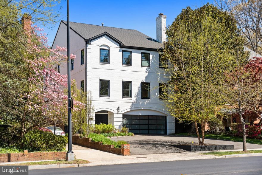 Ideally positioned along one of Northwest Washington’s most distinguished residential corridors, 4725 Massachusetts Avenue NW is a fully renovated, 5,800-square-foot residence that combines timeless architectural presence with modern luxury and exceptional functionality.

The home features generously scaled living and entertaining spaces, highlighted by hardwood floors throughout and an abundance of natural light. A state-of-the-art kitchen anchors the main level, outfitted with Sub-Zero and Wolf appliances, an integrated espresso machine, and custom cabinetry.

With six bedrooms and six bathrooms, the residence offers remarkable flexibility. A first-level guest suite with kitchenette provides ideal accommodations for extended stays, multigenerational living, or au pair use. The home is further enhanced by two laundry rooms and a smart home control system for lighting, climate, and security. Additional features include a fourth-level attic with generous storage, a beautifully landscaped flat backyard ideal for outdoor entertaining or play, and a two-car garage complemented by a circular driveway that adds both convenience and curb appeal.

Set back from Massachusetts Avenue, the property offers a rare sense of privacy while remaining moments from Spring Valley, American University Park, neighborhood retail, and convenient access to downtown Washington, DC. 4725 Massachusetts Avenue NW represents a turnkey opportunity for buyers seeking space, sophistication, and modern comfort in one of the city’s most sought-after locations.