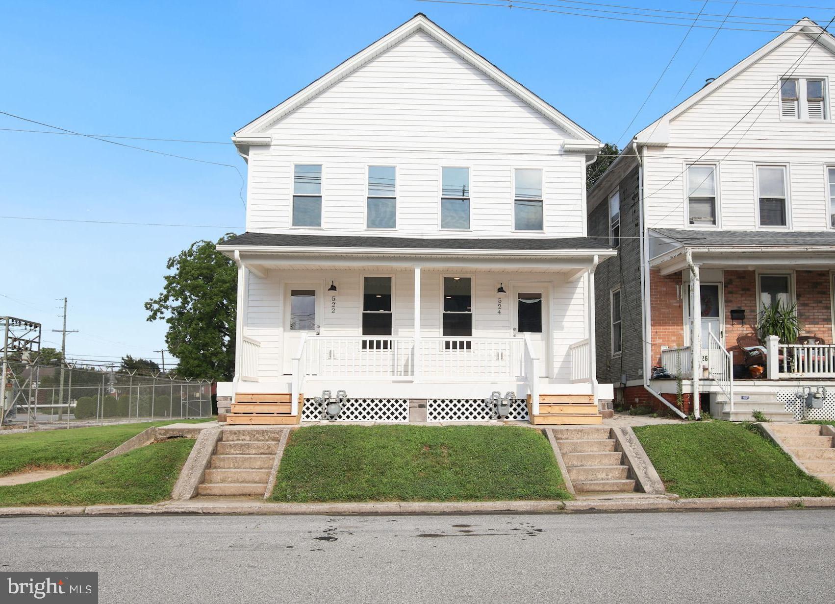Fully renovated from the studs up, this beautifully finished 3-bedroom, 1.5-bath home offers fresh, modern living with nothing left untouched. Every major component has been updated, including new drywall, flooring, electrical, plumbing, HVAC, siding, roof, and even freshly poured concrete patios and a renovated front porch. Inside, you’ll find an open main level featuring warm butcher block countertops, white cabinetry, and a combined half bath and laundry area that adds both practicality and style. The layout flows seamlessly into the living space, with all-new flooring throughout. Upstairs features 3 spacious bedrooms and a fully updated full bath with contemporary finishes. Out back, enjoy your own concrete patio and a shared rear parking pad with no street parking necessary. This home combines high-quality craftsmanship with modern style, inside and out. Don’t miss your chance to see this beautiful home, schedule your showing today!