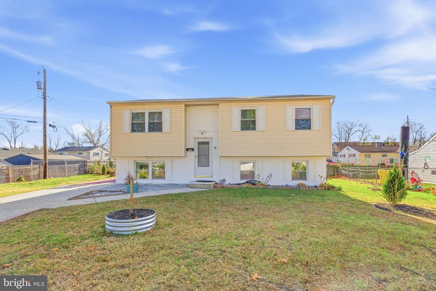 Join us for open house this Sunday from 12 PM to 2 PM. Welcome to your dream home in the sought-after Munroe Gardens community! This beautifully updated brick-front split-level is tucked away on a quiet cul-de-sac, offering the perfect blend of comfort and convenience. Inside, you’ll find a bright and spacious layout featuring vaulted ceilings, gleaming hardwood floors, and an inviting kitchen ideal for everyday meals or hosting guests.
The lower level provides a generous recreation room—great for movie nights, gatherings, or relaxing after a long day. It also includes a full bedroom and bathroom, making it perfect for guests, in-laws, or extended living. Additional storage and a walkout basement add even more functionality.
Step outside to a large, fully fenced backyard that’s perfect for pets, outdoor fun, or weekend barbecues. With no ground rent and an unbeatable location close to BWI, Baltimore, Annapolis, DC, shopping, and dining, this home checks all the boxes.
Don’t miss your chance to make this charming split-level yours—schedule your private tour today!