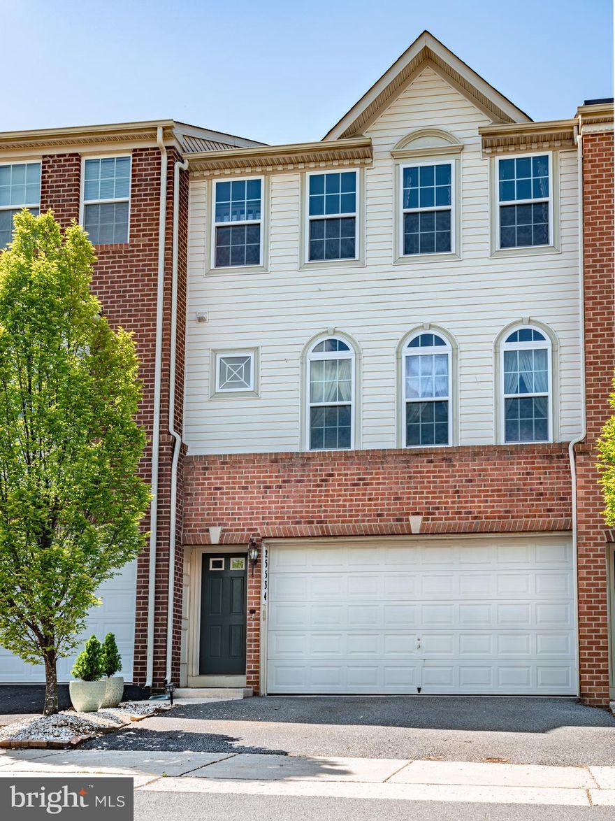 Beautiful 3 level, brick townhome in highly sought after Magruder's Overlook! Spacious owner's suite with soaking tub and large walk-in closet, plus two additional beds and second full bath on upper level. Large, open-air, hardwood main level with living, dining, kitchen and half bath, as well as rear-access to relaxing, shaded patio.  Kitchen has updated GE appliances, and the whole house efficiently maintains its comfort with a Nest thermostat.  Beautiful wood finished stairs lead down to the fully finished basement, with half bath rough-in, plus separate laundry room, and access to the 2-car garage.  Quiet, dead-end street, with playground across the street. Quick access to Upper Magruder Branch Trail.