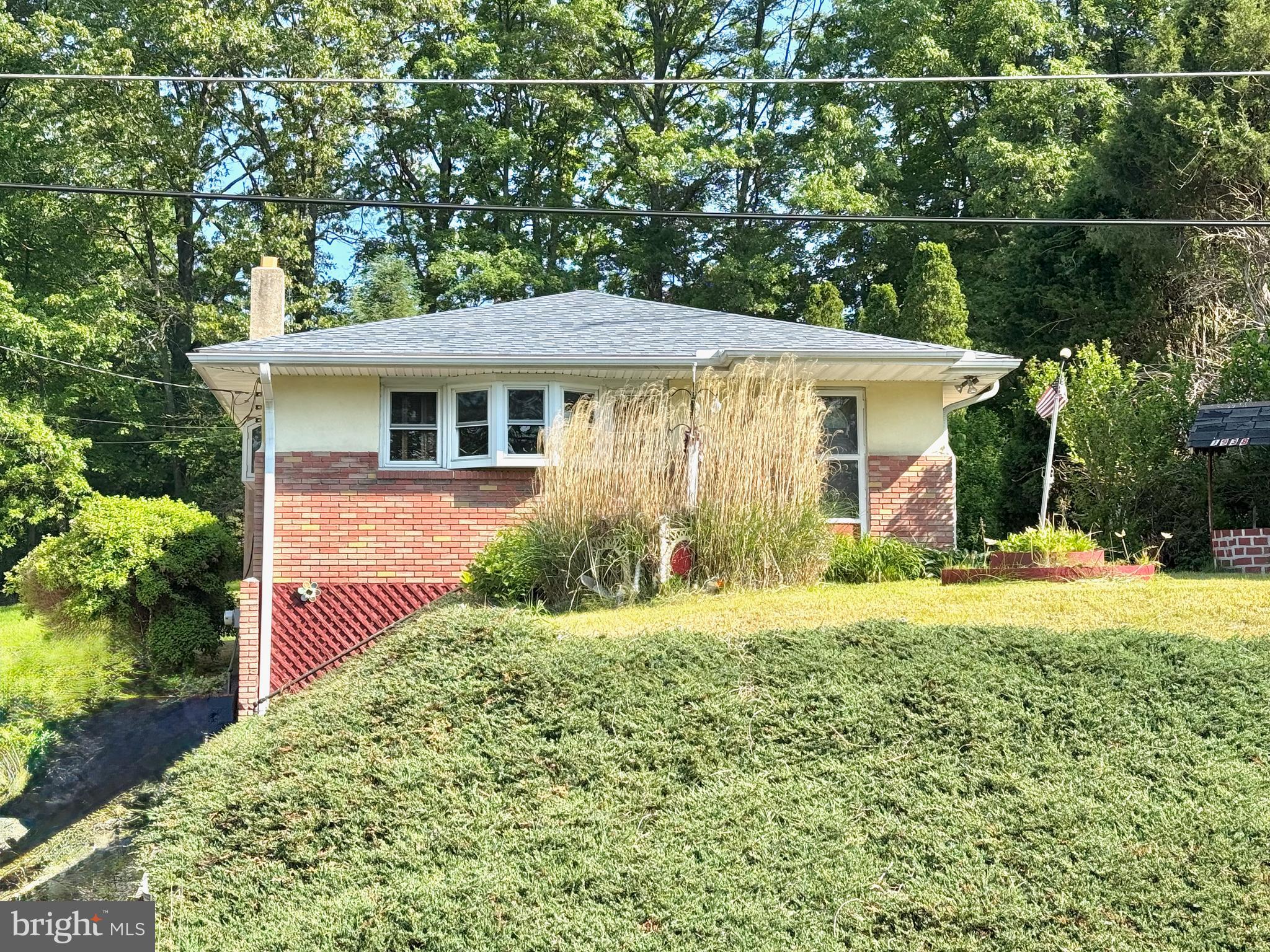 GREAT Price in a GREAT Location! Perfectly situated within walking distance to THREE schools, the public pool, ball field and MORE! Location, Location, Location! Come make this house your home! The main level features a Kitchen, Dining Area, Living Room, THREE Bedrooms and the home's Full Bath! The finished Lower Level is where you will find the Family Room with bar, Rec Room, Half Bath and Laundry Area! Outside you will see the off-street parking, nice yard and tree lined setting! Don't delay, please call to schedule your showing today!