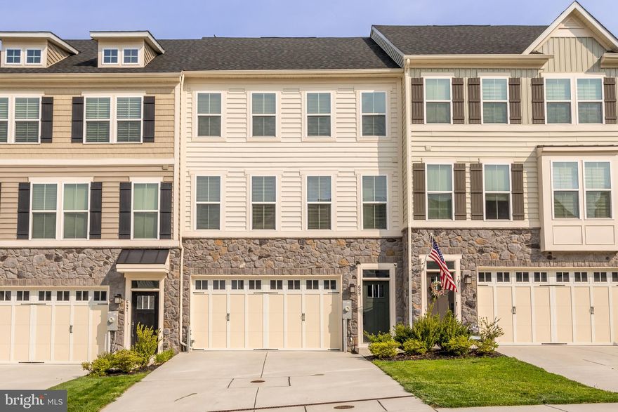 Welcome Home to Comfort, Style, and Space in Magness Mills.
Step into this beautifully upgraded three-story townhome with a two-car garage, ideally located in the highly desirable community of Magness Mills. Thoughtfully designed with custom touches and bump-outs, this home offers exceptional space and elegance throughout.
The main level features gleaming hardwood floors and a true chef’s kitchen—complete with upgraded cabinetry, expansive counter space, and a layout perfect for both cooking and entertaining. The kitchen sits at the heart of the home, opening to a spacious dining area on one side, which leads to a low-maintenance composite deck through French doors. On the other side, the bright and inviting great room offers seamless access to a convenient half-bath. Natural light floods the entire floor through numerous windows, creating a warm and welcoming atmosphere.
Upstairs, the owner’s suite is a true retreat—generously sized with a large walk-in closet and a luxurious en-suite bath featuring dual vanities, a linen closet, and an oversized shower with two shower heads. Two additional bedrooms share a well-appointed full hall bath, and the laundry room is conveniently located on the bedroom level.
The fully finished lower level provides even more living space, including a large recreation/exercise room and an additional full bathroom—perfect for guests, a home office, or recreation.  Garage floor painted.
Built with comfort and convenience in mind, this home is filled with upgrades and modern amenities. Don’t miss your chance to tour this stunning property—come see it in person and imagine calling it your own.