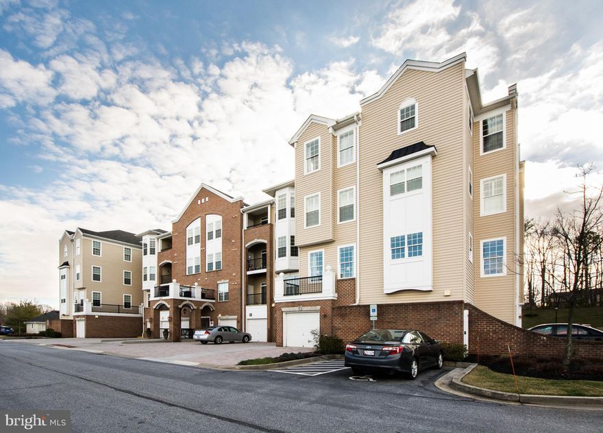 Fantastic condo unit in the sought after Gatherings at Forest Glen community.  Unit features spacious room sizes, hardwood floors in living with crown moldings, large family room, separate dining area with plenty of light and a lovely kitchen with breakfast bar, cherry wood cabinets, ceramic counter and stainless steel appliances. The master suite has a full bath with whirlpool tub, separate shower and dual vanity. Enjoy the community recreational paradise with its outdoor pool,  walking trails, exercise facilities, playgrounds, etc.  Quick access to major highways and easy commute to MARC train.