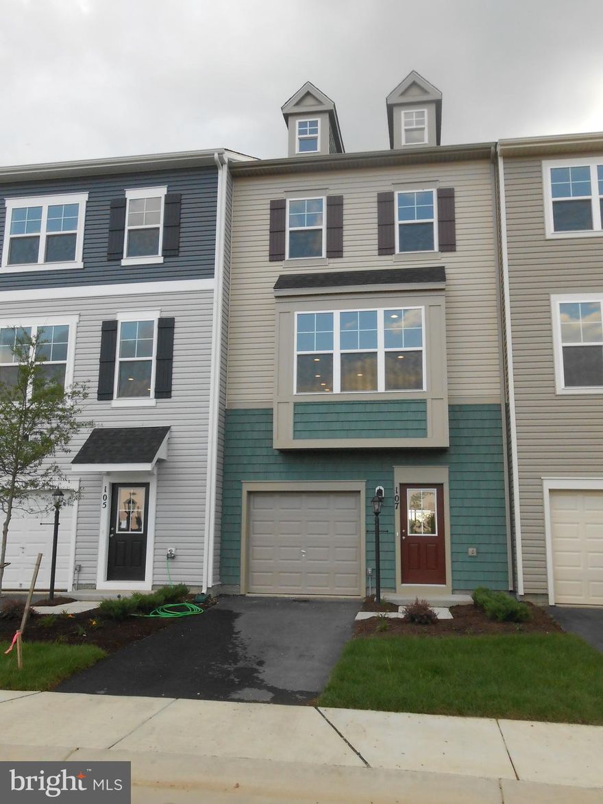 Three bedrooms, 2 full baths and 2  1/2 baths. Large open floor plan.  Finished basement with walk out to the backyard.  Spacious kitchen; with room for kitchen table.  Large deck.  HOA fee includes trash pick up and snow removal.  Enjoy the pool and other amenities. Great commuter location.