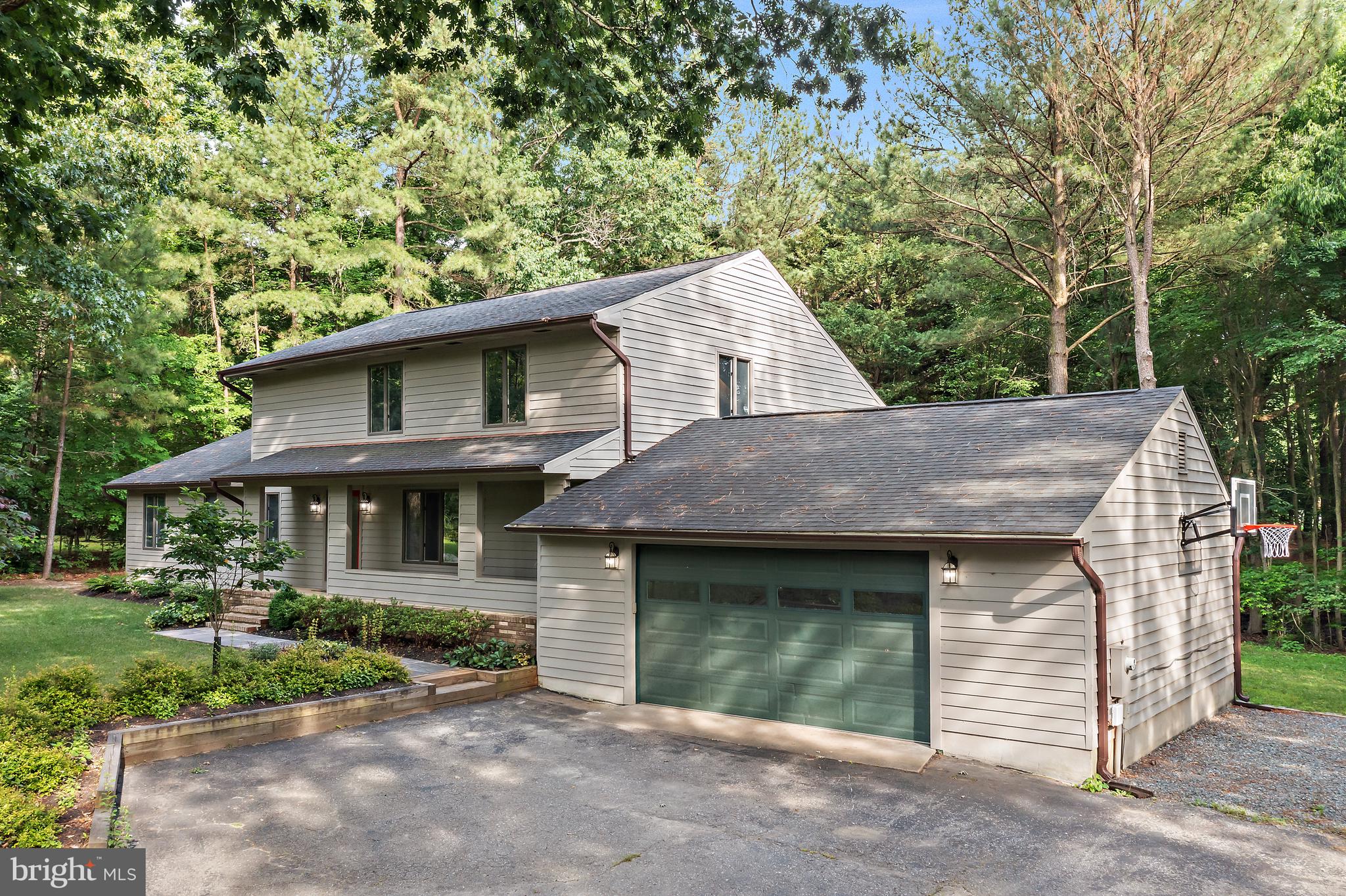 Enjoy a waterfront country club lifestyle with the privacy of wooded views at 4 Bunkers Court! This beautifully updated and private creek front home is tucked away on a wooded 1.53 acre cul-de-sac lot at the top of Little Greenwood Creek in the sought after waterfront golf course community of Prospect Bay. From soaring vaulted ceilings to thoughtful upgrades throughout, this home combines comfort, style, and space indoors and out.
Step inside to a welcoming foyer and formal dining room with updated lighting. The showstopper of the home is the stunning family room featuring vaulted wood planked ceilings and a striking stone fireplace, an architectural focal point that adds warmth and character.
The updated kitchen is a chef's delight with new stainless steel Frigidaire Gallery appliances, granite countertops, freshly installed tile backsplash, new flooring, and a sleek hood vent. A cozy breakfast nook with custom built-ins offers extra storage and bar countertop seating.
Just off the kitchen, you’ll find a new mudroom and laundry area with two additional storage closets and a newly added powder room, all connecting to the oversized two-car garage for everyday convenience.
The main level offers three bedrooms and two full bathrooms, including a serene primary suite with private patio access, two closets, and a fully updated en suite featuring a walk-in glass enclosed shower with overhead and wall mounted shower heads, and a double vanity with modern finishes.
Upstairs, a spiral staircase leads to a spacious and versatile loft ideal as a fourth bedroom, office, or entertaining space. This grand loft includes a game and TV area, pool table, new full bathroom with designer tile and a glass shower door, and a custom-built bar area with a beverage fridge, microwave, sink, cabinetry, and backsplash perfect for hosting guests in style.
Outside, step onto your private bluestone patio and hot tub, surrounded by the natural beauty of your wooded lot. The sellers have explored the potential of building a boardwalk to the creek with a floating dock buyers to verify offering exciting possibilities for enjoying the waterfront setting.
Living in Prospect Bay means more than just a beautiful home, it’s a lifestyle. Enjoy first class amenities including a championship 18 hole golf course, tennis and pickleball courts, outdoor pool, clubhouse with dining, social events, boat basin, and more.
Whether you're hosting in the open concept living spaces, relaxing in your upstairs retreat, or soaking in the serenity of your private wooded backyard, 4 Bunkers Court is the perfect place to call home!