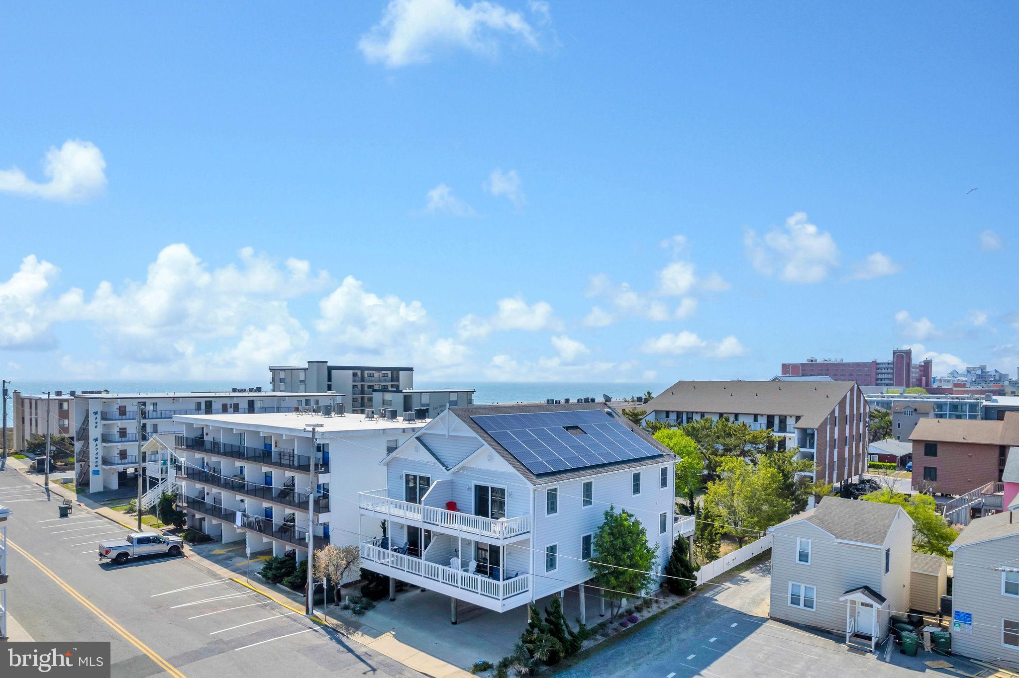 The Ultimate Coastal Compound:
Welcome to Dolphin Beach on 71st Street, where an unprecedented opportunity awaits! Imagine owning both side-by-side, ocean block townhomes, a truly rare offering that combines luxury, space, and ultimate flexibility – all with zero condo fees. This isn't just a home; it's your private coastal compound.
Whether you're dreaming of an expansive family retreat, a savvy investment with incredible rental potential, or a unique multi-unit beach haven, this is the find you've been waiting for. With a combined 8 bedrooms and 6 baths, both units are fully furnished and move-in ready, offering unparalleled convenience.
Step inside and discover open-concept living bathed in natural light, accentuated by soaring cathedral ceilings. Each gourmet kitchen is a culinary dream, boasting granite countertops, quartz tile backsplashes, sleek white cabinetry, and a breakfast bar – perfect for casual mornings or entertaining.
Sip your morning coffee on one of your private balconies, enjoy al fresco dining in the serene screened-in porches. The fenced-in backyard provides a perfect oasis for entertaining or simply unwinding after a day at the beach.
Both residences offer thoughtful features like multiple vehicle covered private parking, under the home, an outdoor shower with hot and cold water (perfect for sandy toes!), and ample extra storage for all your beach gear. For the eco-conscious and savvy owner, leased solar panels mean no electric bill, blending sustainability with high-end coastal living.
This isn't just a purchase; it's an exclusive invitation to experience Ocean City living at its finest. Don't let this one-of-a-kind chance slip away at Dolphin Beach on 71st Street.
*This property is to be sold with 13-B 71St St, Ocean City, MD 21842*