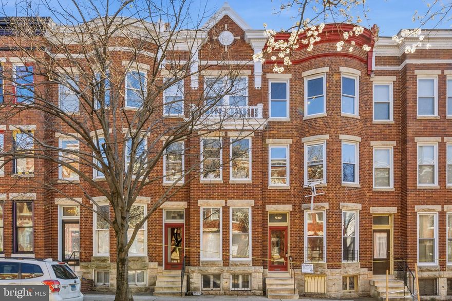 NEWLY PRICED!
Discover this generous 5 bedroom, 2.5 bath, four-level rowhome in the heart of Charles Village, offering an exceptional blend of historic charm and modern comfort. Wood floors flow throughout much of the home, creating a warm and inviting feel. The updated kitchen provides a bright and functional space for daily living and entertaining. A separate formal dining room adds elegance and flexibility for gatherings of any size. The fenced backyard offers privacy for outdoor enjoyment, gardening, or relaxing in your own urban retreat. The spacious lower level delivers abundant storage and endless possibilities—create a workshop, studio, fitness area, or anything your lifestyle inspires. On the second level, a covered deck extends the living space and offers a peaceful outdoor escape. With its expansive layout and desirable features, this Charles Village residence presents a rare opportunity to own a well-maintained home with room to grow and spaces to personalize. Photos for this listing have been virtually staged.