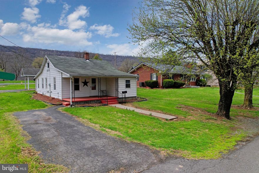 Just outside the historic town of Romney, WV, this 2-bedroom, 1-bath home sits on a desirable corner lot and offers the perfect blend of comfort and location—with a beautiful mountain view to enjoy. Featuring a separate dining room and a convenient carport, this home is ideal for easy everyday living.
Enjoy being just minutes from public river access, schools, the hospital, and local dining. Whether you're looking to downsize or purchase your first home, this property  for affordability, convenience, and scenic charm.