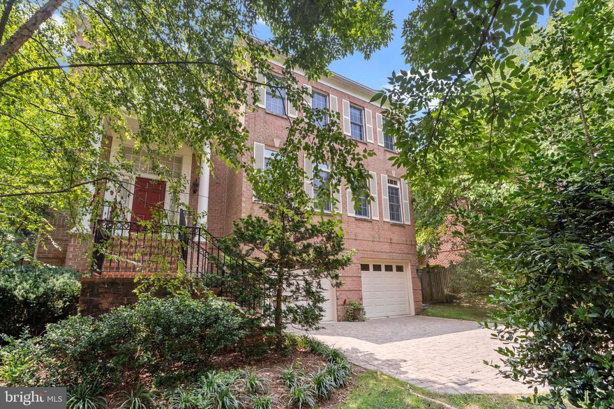 **Spacious all brick home for energy efficiency and low maintenance** *surrounded by trees and tucked away on a cul-de-sac in the Cardinal, Swanson, and Yorktown school pyramid**Extensive stack stone walls have integrated drainage and create planting areas for mature trees, shrubs,  and perennial flowers**The  lawn areas are ideal for play, sports, pets, and gardening**Large gathering are easily accommodated on the private stone patio off the grilling deck**This well-loved home has been buffed and polished with fresh paint throughout and these recent updates:  **2021-gas furnace and air conditioning for main and lower levels**2020-electric heat pump and air conditioning for upstairs**2019-gas water heater**2021-powder room vanity and toilet**2020-GE Monogram microwave and wall oven**2018-Bosch dishwasher, front loading washer and dryer**2018-well designed and professionally- built  stack stone retaining walls in rear yard and extensive  plantings added**

 Enter through a foyer to a traditional living room and dining room with wood floors, high ceilings, and tall windows**French doors at the office provide privacy, and the built-ins and shutters at the windows provide architectural interest**A gas fireplace is the focal point of the family room and doors open to the private deck and patio**Adjoining the kitchen is a breakfast area with views of the garden**The kitchen provides abundant wood cabinets, generous granite countertops, gas cooktop, and a long prep island**A pantry and powder room are in a hall off the living area**Wood floors continue upstairs where the primary bedroom has an office area, two walk-in closets and a private bathroom**Two vanities in the bathroom, a soaking tub, and oversized shower highlight the bathroom**The second bedroom has a step in closet and bathroom with soaking tub and linen storage.  The third upstairs bedroom has a double closet and private bathroom**In the laundry room, there is additional cabinet storage, a folding counter, and laundry sink**Another linen closet is in the hallway**The lower level features a big rec room with second fireplace, wet bar with beverage fridge and dishwasher along with space for a gym, media, and play**The fourth bedroom is set apart in a private part of the basement and is ideal for an in-law, au pair, or college student**The oversized two car garage has space for garden equipment, bicycles, workshop and hobbies**A large separate storage room is just off the garage**The low HOA fee is for maintaining the common areas*

**Walk to Lacey Woods and Big Walnut Park, bike path, and near both Westover Village and Lee-Harrison Center**Easy access to Washington, Rosslyn-Ballston business corridor, Fort Myer/Henderson Hall, Foreign Service Institute and Army Readiness Center, Pentagon and Crystal cities, Amazon HQ2, National Airport and Rt.66 for reverse commute to Tyson's, Dulles Tech Corridor and Airport**A classic home in pristine move-in condition awaits the savvy buyer who values space and a most convenient location**