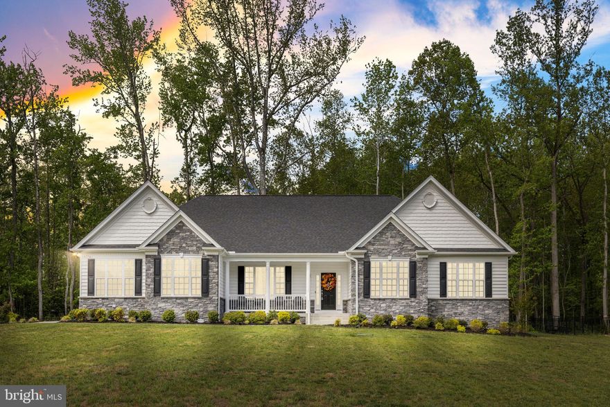 Welcome to Oakwood Estates—where space, upgrades, and lifestyle come together in this nearly new, thoughtfully enhanced home.

With 4 bedrooms and 4.5 baths, this home offers exceptional flexibility, including a rare main-level secondary bedroom with its own ensuite—perfect for guests or multigenerational living. 

The primary suite is truly a retreat, featuring a tray ceiling, an expansive walk-in closet, and a spa-inspired bathroom complete with a deluxe double shower.

At the heart of the home, the kitchen is designed to impress—boasting two oversized islands (one with seating for entertaining), double wall ovens, a gas cooktop, and a spacious pantry. The kitchen flows seamlessly into the inviting family room, where a cozy gas fireplace creates the perfect gathering space.

The partially finished basement adds even more versatility, with dedicated spaces for a theater room, karaoke room, and home gym. A pool table can convey, making this an entertainer’s dream from top to bottom.

Outside, enjoy a peaceful setting on a spacious corner lot with a grilling and picnic area that backs to woods for added privacy. The 2-car garage offers ample space for vehicles, lawn equipment, and storage.

Oakwood Estates is known for its quiet, friendly atmosphere and exceptional amenities, including a beautiful clubhouse, resort-style pool with a children’s splash area, tennis courts, and a playground.

This is the one that checks every box—modern, spacious, and move-in ready.