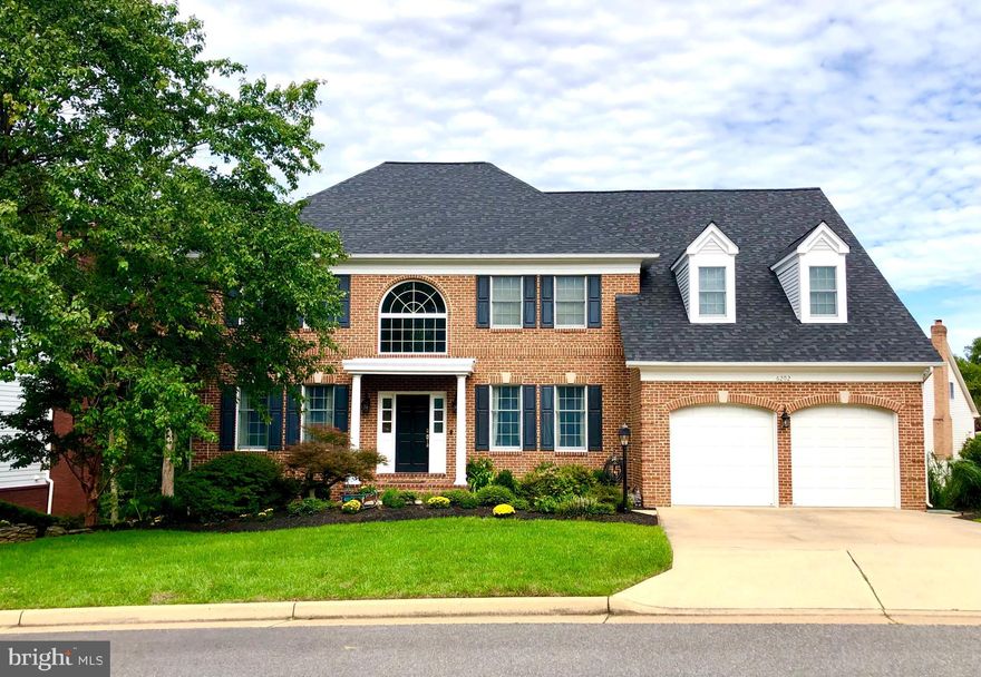 Spectacular 6 bedroom/5 bath home on Woodland Lake.  This home has updates throughout: freshly painted (2021) , new hardwoods (2021),  new roof (2021), new Trex deck (2021), new LED lights throughout (2021), new switches and outlets (2021). From the moment you enter the front door and step onto the marble entrance,  you will sense the quality of this fabulous home starting with the abundance of chair railing and crown molding.  Anyone who enjoys cooking will fall in love with the newly renovated gourmet kitchen (2021), with double ovens,  beautiful granite, new maple cabinets, and a custom designed pantry (2021). The Butler's Pantry also adds extra counter and storage space. The laundry room is just off the kitchen and has recently been updated and provides easy access to the two car garage.
Relax this Fall in front of one of the two recently replaced gas fireplaces, or plan to entertain friends and family on the spacious new Trex deck where you can grill out and enjoy views of the peaceful Woodland Lake.  The over-sized Owner's Suite is large enough to include a sitting area , along with walk-in closets.  The Owner's bathroom was just renovated ($30K), including a large frameless shower with rain shower head and heated floors.  Relax in the new free standing soaking tub with aeration or enjoy the beautiful granite with dual sinks. There are 3 other bedrooms and two additional bathrooms on the upper level.
Working from home is made easier with a large office with beautiful built-in bookcases and storage. The large picture window in the study also provides views of the lake. The house has ample storage with the many closets, pull down attic steps with floored storage space and more storage on the lower level.
There is an entire extra home on the lower level.  Perfect for an In-law Suite with access from the inside, as well as, a separate exterior entrance. The lower level has 10 ft ceilings along with a large den with a gas fireplace and lots of extra storage. The downstairs is well lit with natural light from the many window, along with a full bar area with refrigerator, sink and microwave oven.  There is a walkout from this level to enjoy the patio and views of the terraced garden backyard and lake. The home is made comfortable with the dual HVAC systems (upper level HVAC replaced in 2020 ($9K)).
This home is a true jewel and won't stay long on the market.