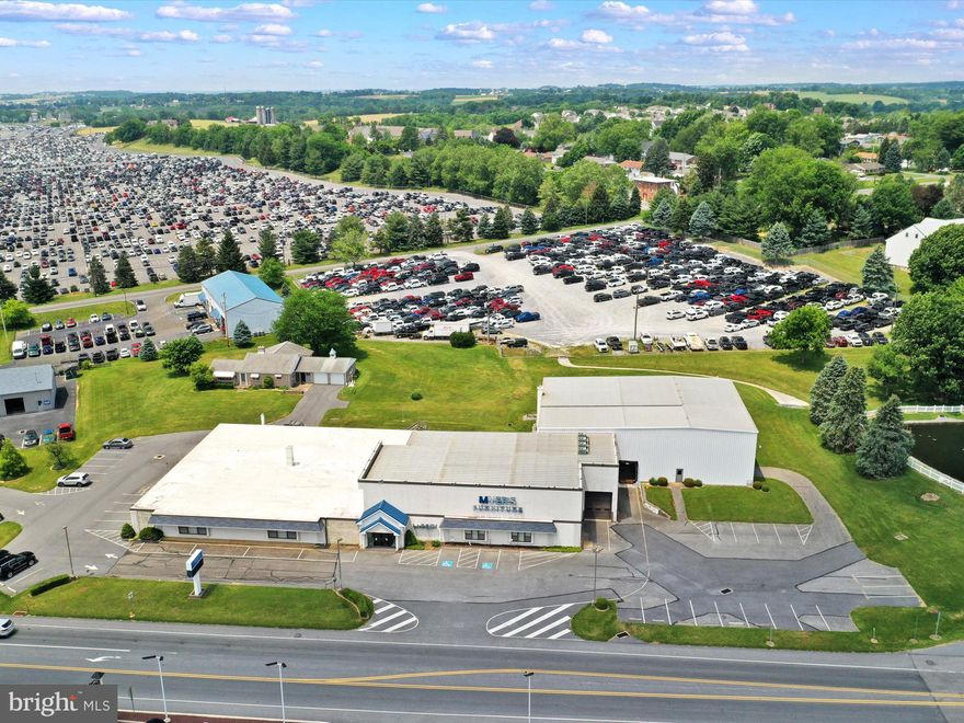 Former furniture store. 30,000 sq ft - show room, warehouse, office. Loading docks, parking, lighted, expandable. Electric -208V, 3 phase, 880 Volt. Very good condition, great location. Many uses will be possible. Includes 2 parcels totaling 5.3 acres. Other parcel # 500-02057-0-0000.