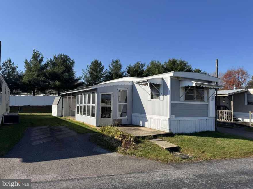 Handyman special. Home is discounted because it needs work. New flooring, cleaning , etc needed. Welcome to this mobile home for sale in a well maintained park! Available for move in asap to a park approved buyer! It is located in a beautiful, well kept mobile home community. Refrigerator included, washer/dryer included, outside storage shed ( 8' x 10' ) , off street parking, and professionally managed. This property backs right up to the township park and community center with a walking trail (Fit Trail), playground, sports fields, library, etc. Also conveniently located close to plenty of shopping! Schedule your showing today!! 3720 Davidsburg Rd Lot A-3 Dover, PA 17315 Lot Rent; $695 Deposit: must get screened to become park approved.