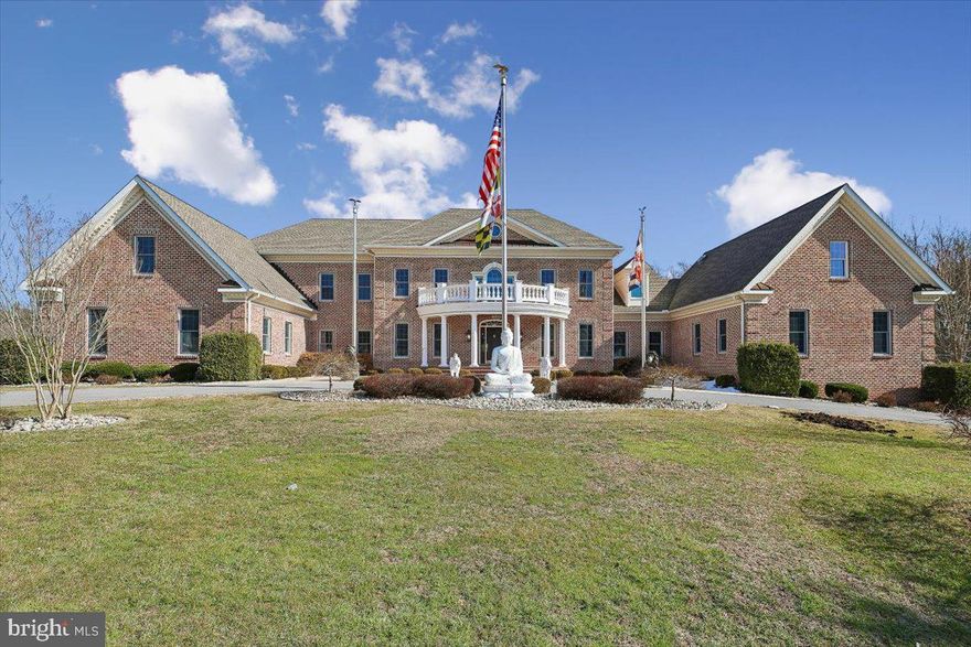 An extraordinary estate offering over 12,600 square feet of masterfully finished living space, designed for those who demand scale, privacy, and uncompromising quality.

This 5-bedroom, 6 full bath residence features two luxurious primary suites, including a first-floor suite with private sitting room,  ideal for multigenerational living or distinguished guest accommodations. Every bedroom offers a walk-in closet and private ensuite. The dramatic great room with coffered ceilings and expansive windows anchors the home, while dual staircases add architectural elegance and flow.

The gourmet kitchen is appointed with Wood-Mode cabinetry, Wolf and Sub-Zero appliances, and a butler’s pantry, seamlessly connecting to formal entertaining spaces, a sunroom, and a sunken family room with fireplace. Waterford crystal chandeliers, custom millwork, built-ins, and three fireplaces elevate the interiors throughout.

The walk-out lower level is exceptional in both scale and finish, featuring soaring 10–12’ ceilings, imported marble flooring, a gas fireplace, full bath, and rough-ins for a future kitchen and additional living spaces,  offering limitless possibilities for extended living or recreation.

Engineered for long-term performance, the home includes geothermal heating and air with six vertical wells, three heat pumps, four-zone HVAC, 600-amp service, Andersen windows, a 2022 roof with transferable warranty, updated baths (2025), and fresh interior paint (2025). A three-level elevator, step-free garage entry, central vacuum, and intercom system enhance both luxury and livability.

Custom exterior lighting, low-maintenance landscaping, an approved brick privacy wall for future gates, and expansive driveway parking complete this rare offering within a highly desirable community. 

A statement residence of extraordinary scale, infrastructure, and presence.