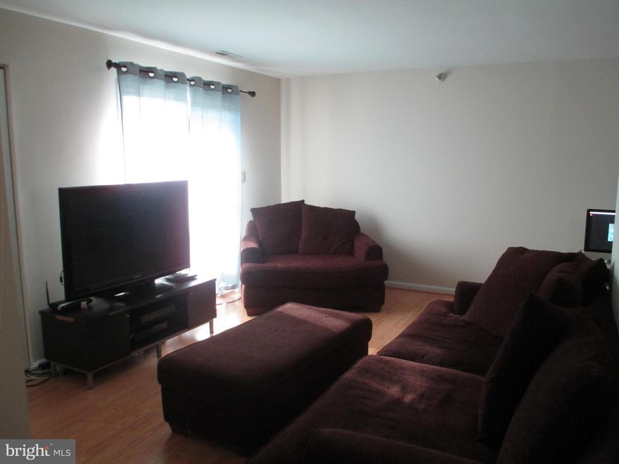 BEAUTIFUL HOME WITH A VIEW!**LIGHT FILLED**BRIGHT WOOD FLOORING**PORCELAIN KITCHEN FLOOR**GRANITE COUNTER TOPS**NEWER KITCHEN CABINETS**CERAMIC TILE FLOORS IN BATHS**FRONT LOADING WASHER/DRYER CONVEYS**EASY ACCESS TO MULTIPLE COMMUTING OPTIONS, SHOPPING AND POST OFFICE**(One bedroom may not be to code)